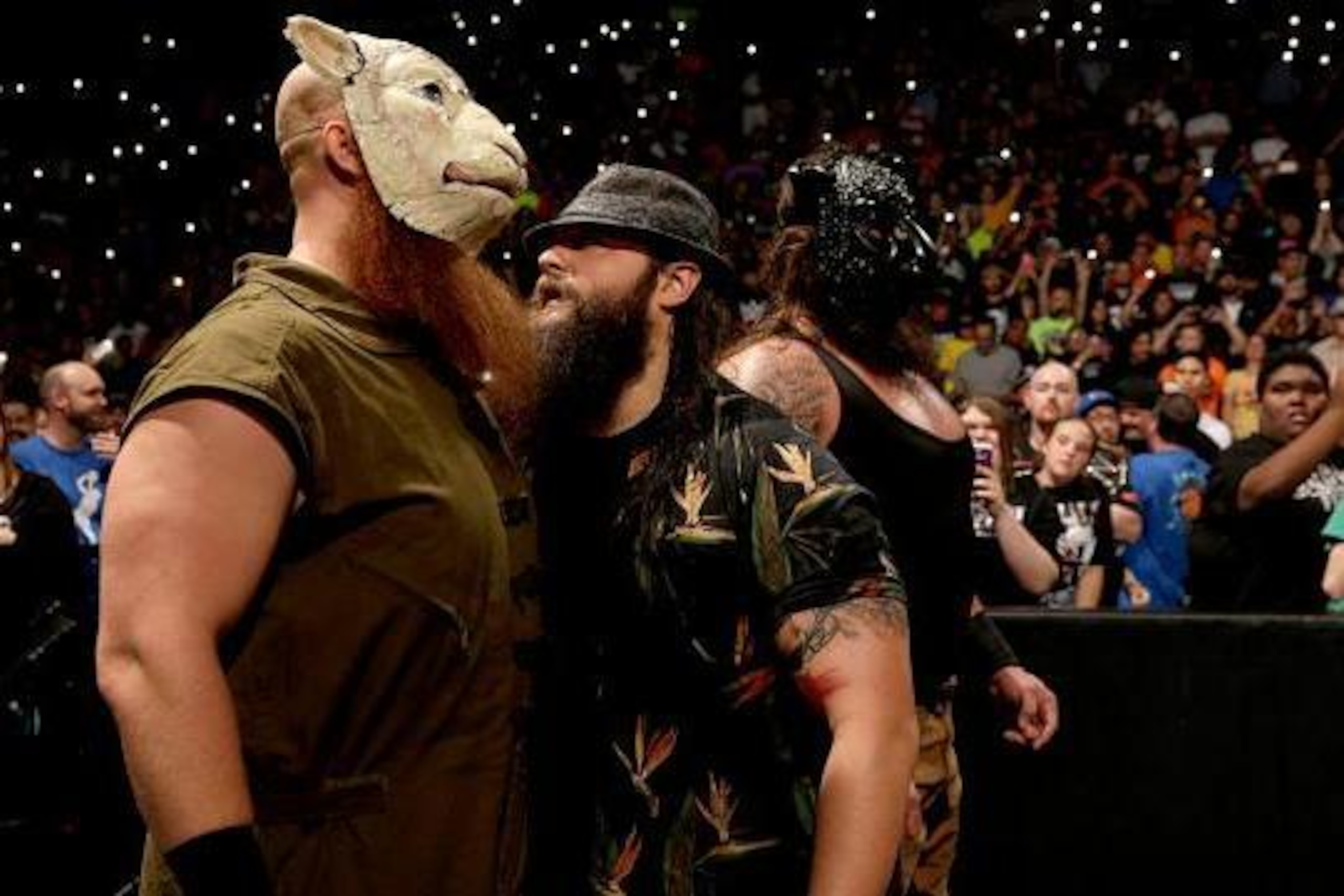 Erick Rowan awaits orders from Bray Wyatt.