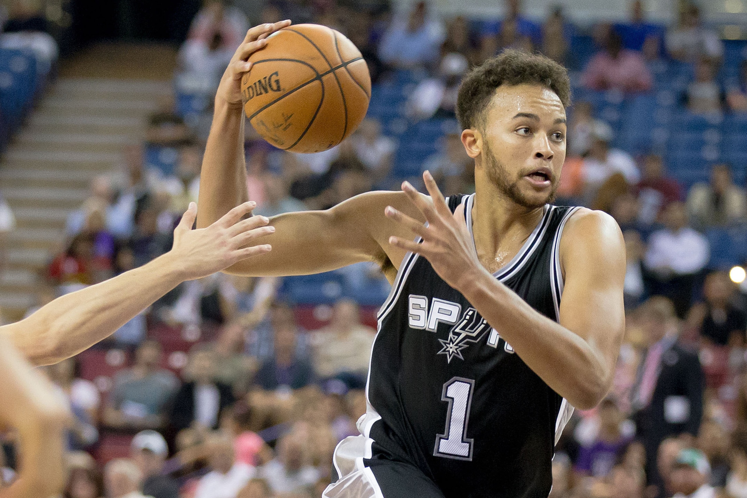 Oct 8, 2015; Sacramento, CA, USA; San Antonio Spurs forward Kyle Anderson (1) dribbles the ball against the Sacramento Kings during the third quarter at Sleep Train Arena. The Kings won 95-92. Mandatory Credit: Kelley L Cox-USA TODAY Sports