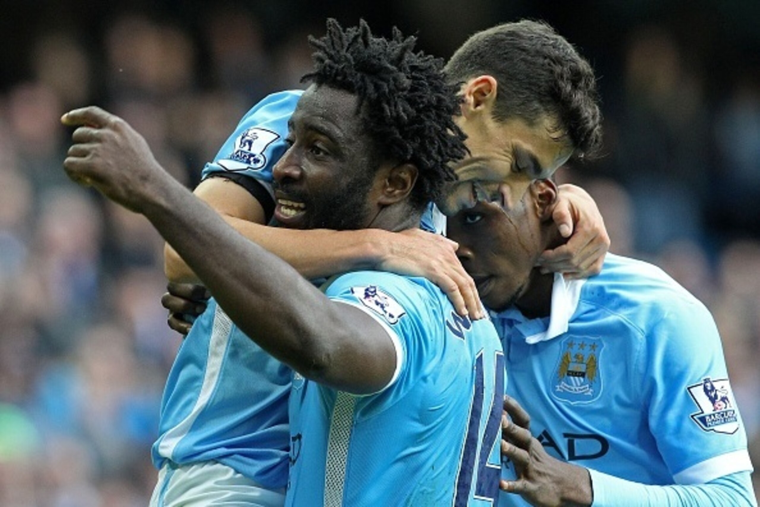 Manchester City's Ivorian striker Wilfried Bony (L) celebrates with teammates after scoring their fifth goal of the English Premier League football match between Manchester City and Bournemouth at the Etihad Stadium in Manchester, northwest England, on Oc Manchester City's Ivorian striker Wilfried Bony (L) celebrates with teammates after scoring their fifth goal of the English Premier League football match between Manchester City and Bournemouth at the Etihad Stadium in Manchester, northwest England, on Oc