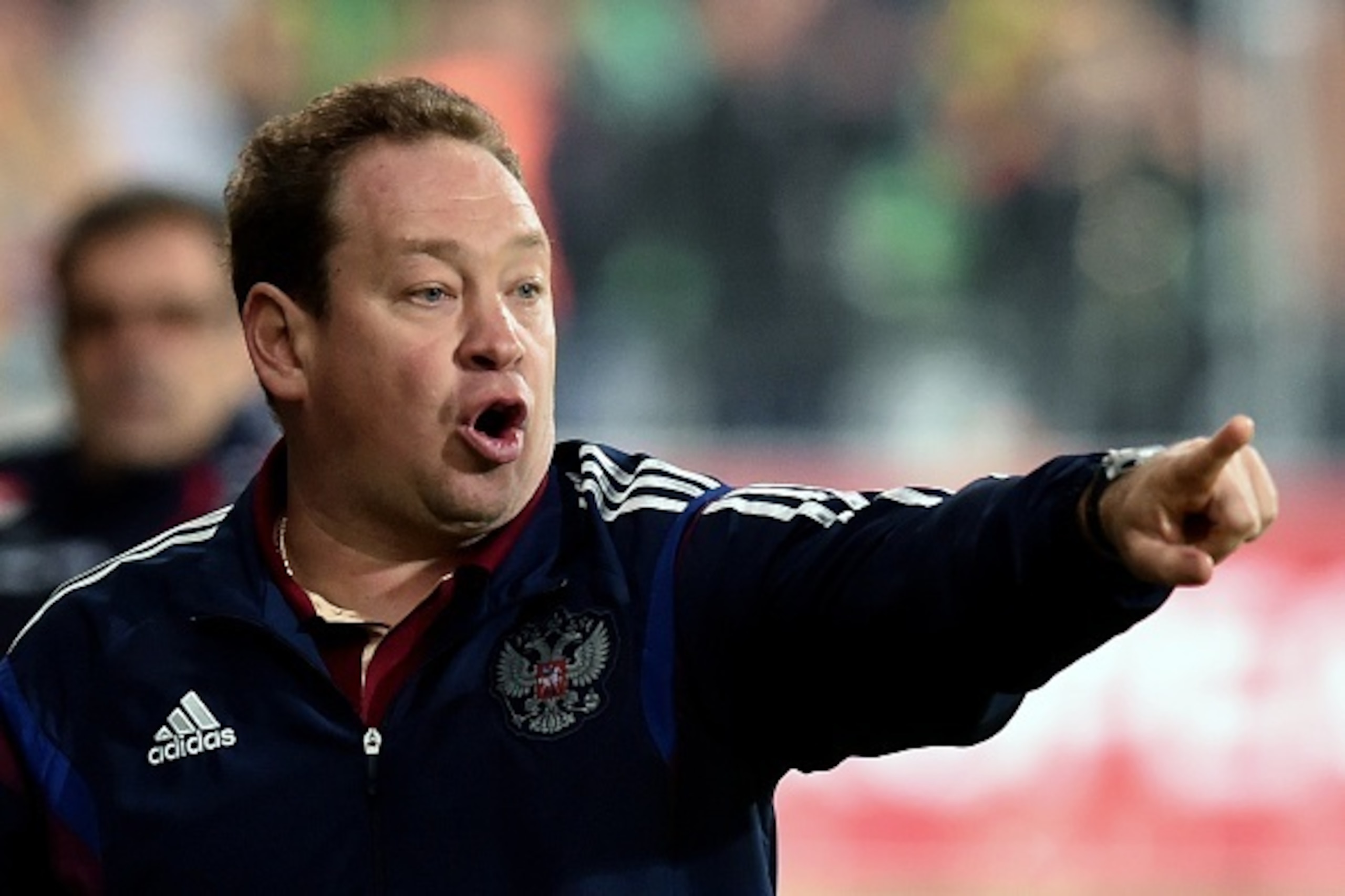 Russia's head coach Leonid Slutsky reacts during the UEFA Euro 2016 qualifying football match between Russia and Moldova in Chisinau on October 9, 2015. AFP PHOTO / KIRILL KUDRYAVTSEV        (Photo credit should read KIRILL KUDRYAVTSEV/AFP/Getty Images)
