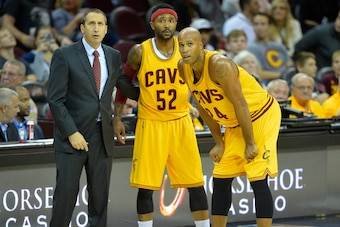 Oct 13, 2015; Cleveland, OH, USA; Cleveland Cavaliers head coach David Blatt talks to guard Mo Williams (52) and forward Richard Jefferson (24) in the second quarter at Quicken Loans Arena. Mandatory Credit: David Richard-USA TODAY Sports