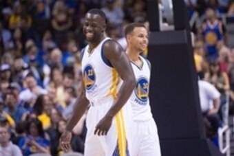 October 5, 2015; San Jose, CA, USA; Golden State Warriors forward Draymond Green (23) and guard Stephen Curry (30) smile against the Toronto Raptors during the first half in a preseason game at SAP Center. Mandatory Credit: Kyle Terada-USA TODAY Sports