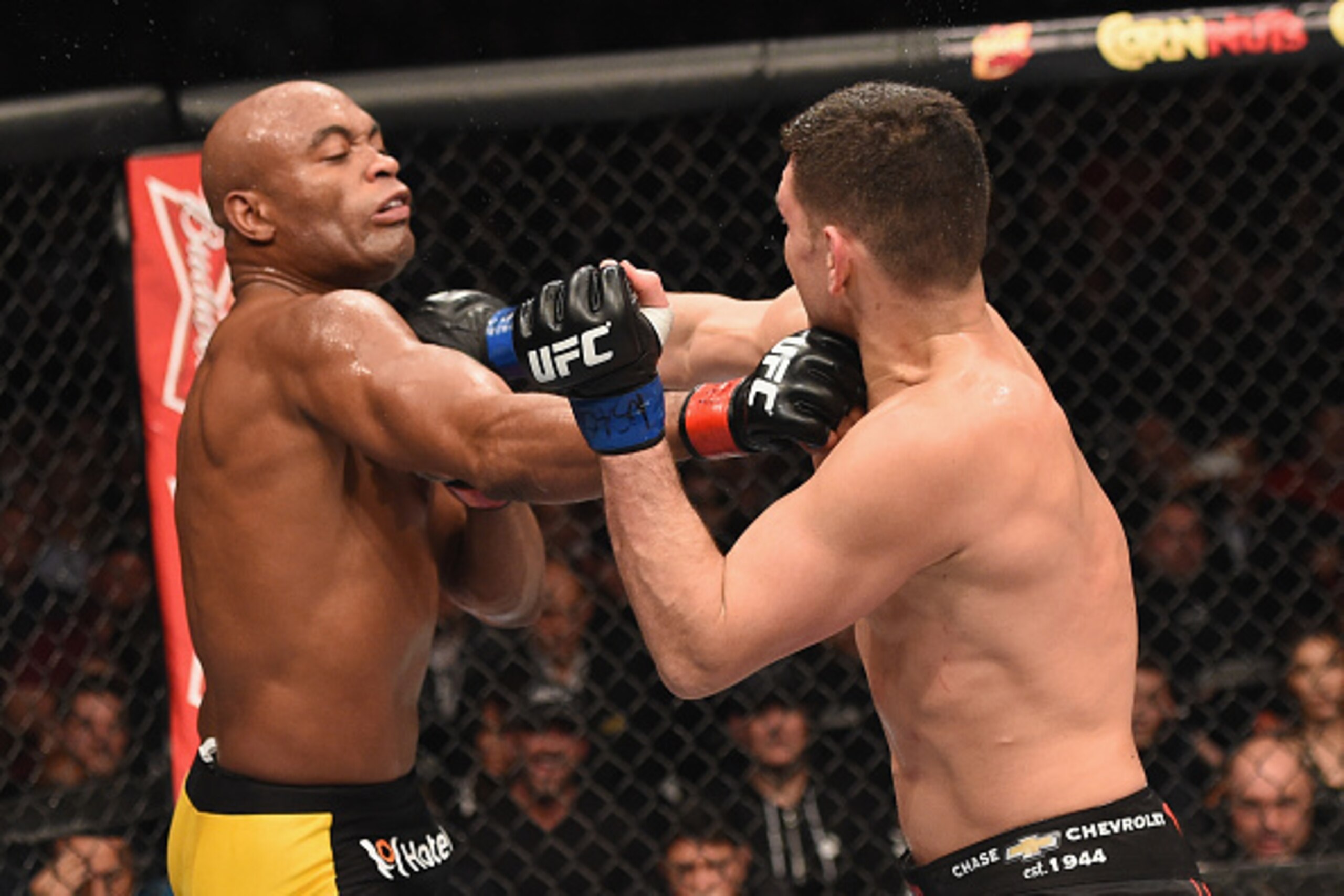 LAS VEGAS, NV - JANUARY 31:  (L-R) Anderson Silva of Brazil and Nick Diaz trade punches in their middleweight bout during the UFC 183 event at the MGM Grand Garden Arena on January 31, 2015 in Las Vegas, Nevada.  (Photo by Josh Hedges/Zuffa LLC/Zuffa LLC 