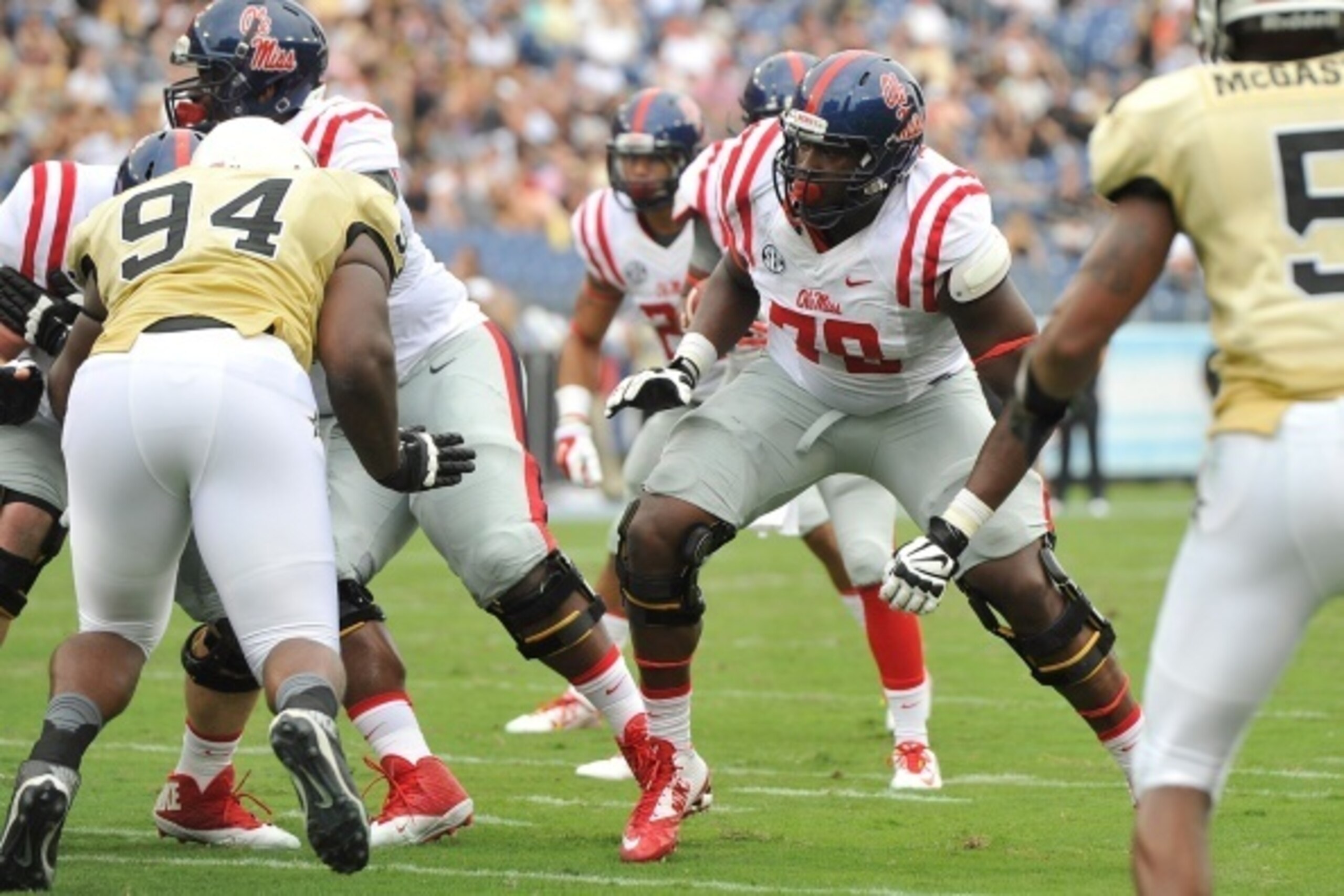NASHVILLE, TN - SEPTEMBER 06:  Laremy Tunsil #78 of the Ole Miss Rebels blocks against the Vanderbilt Commodores at L.P.Field on September 6, 2014 in Nashville, Tennessee.  (Photo by Frederick Breedon/Getty Images)