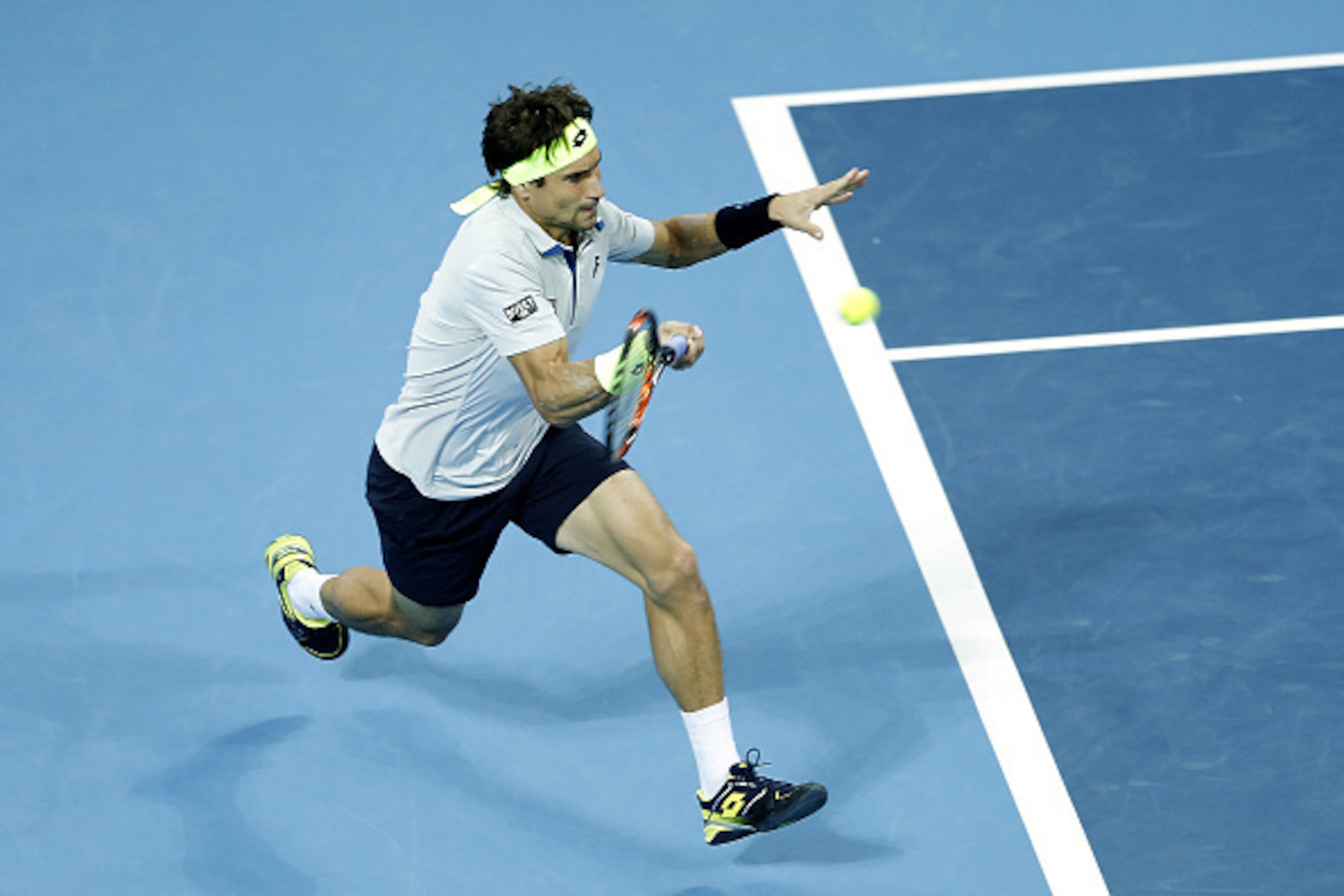 BEIJING, CHINA - OCTOBER 10:  David Ferrer of Spain returns a shot against Novak Djokovic of Serbia during the Men's singles semi-finals match on day 8 of the 2015 China Open at the China National Tennis Centre on October 10, 2015 in  Beijing, China.  (Ph