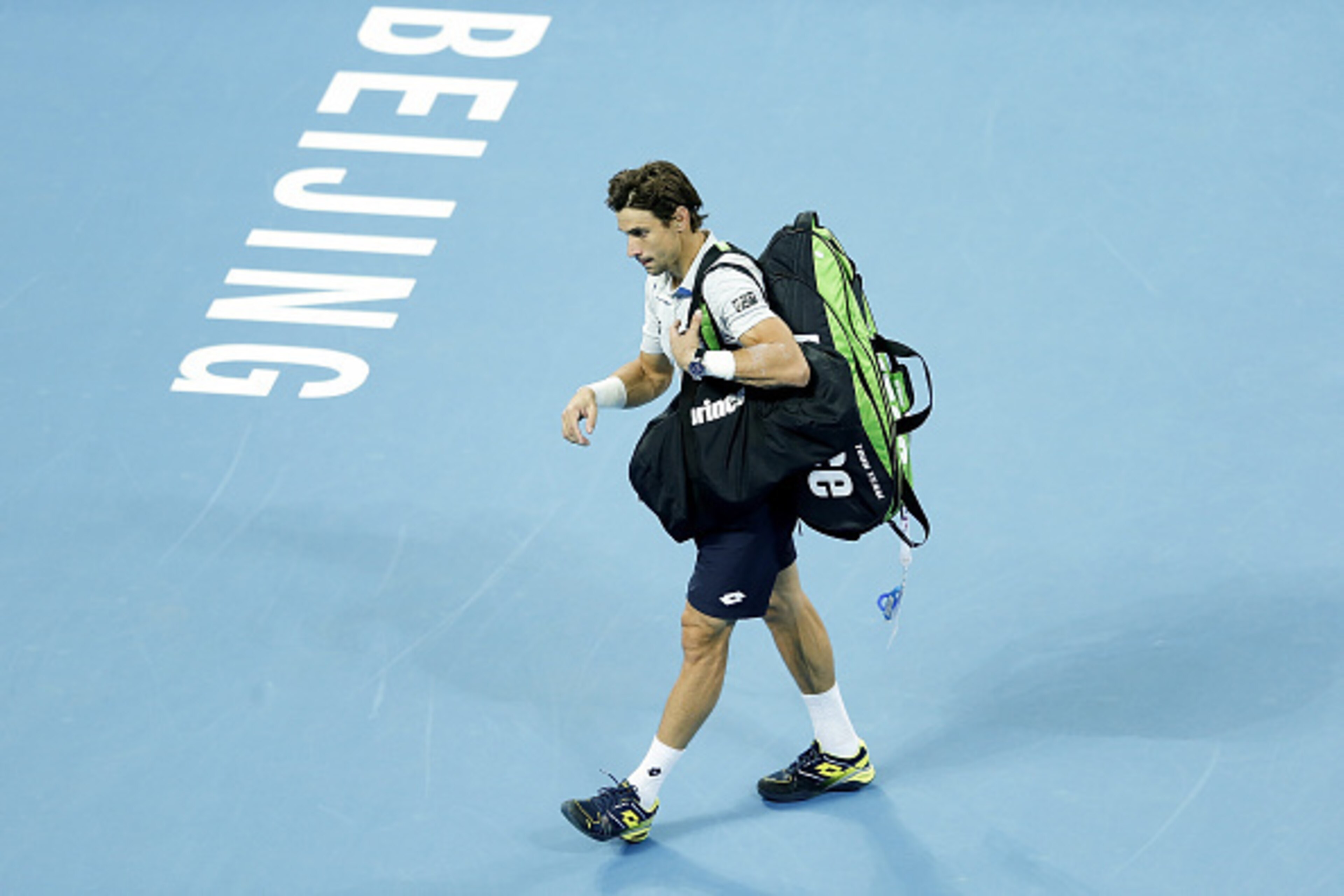 BEIJING, CHINA - OCTOBER 10:  David Ferrer of Spain leaves the court after losing the Men's single semi-final match against Novak Djokovic of Serbia on day 8 of the 2015 China Open at the China National Tennis Centre on October 10, 2015 in  Beijing, China