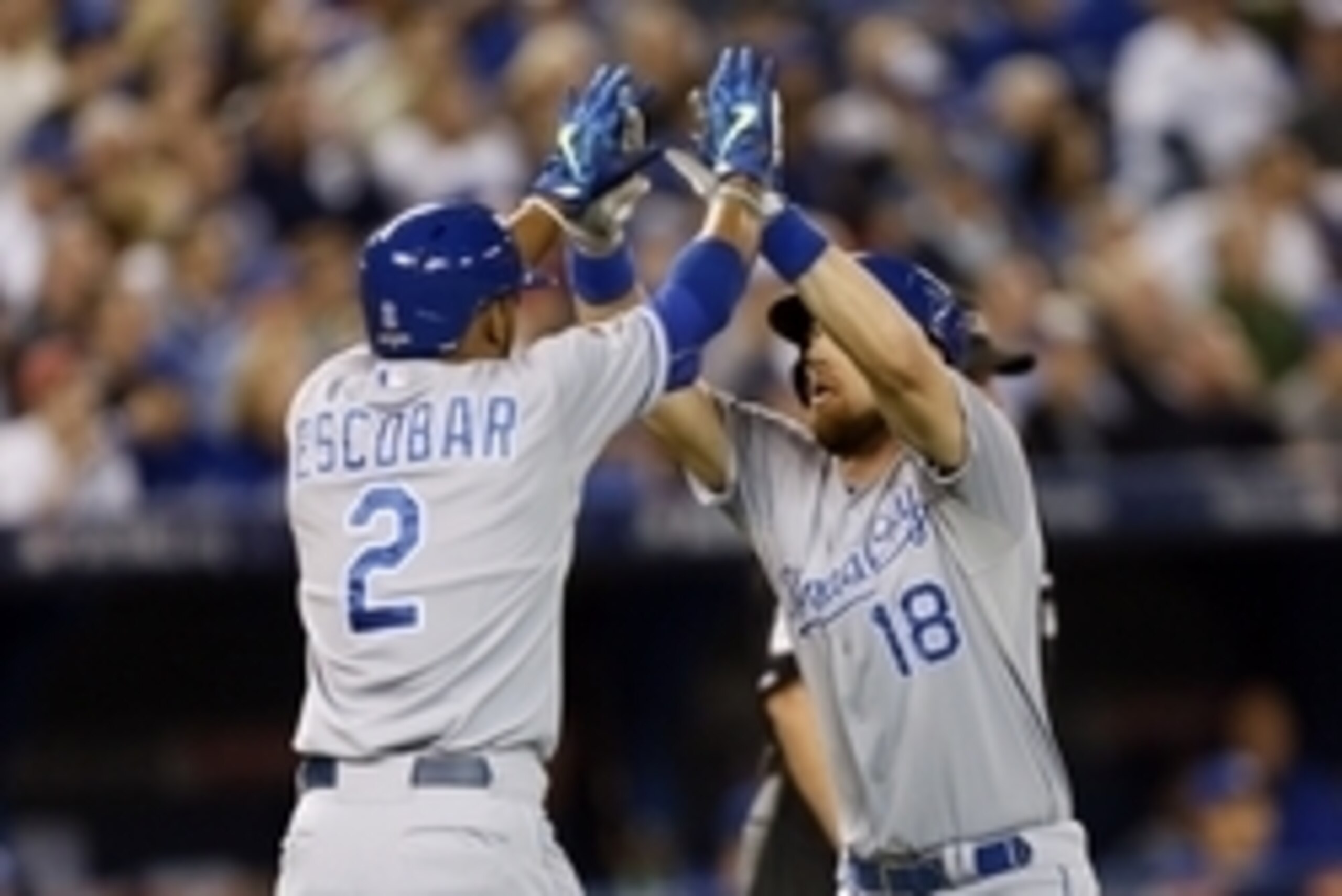 Oct 20, 2015; Toronto, Ontario, CAN; Kansas City Royals second baseman Ben Zobrist (18) celebrates with shortstop Alcides Escobar (2) after hitting a two run home run during the first inning against the Toronto Blue Jays in game four of the ALCS at Rogers Oct 20, 2015; Toronto, Ontario, CAN; Kansas City Royals second baseman Ben Zobrist (18) celebrates with shortstop Alcides Escobar (2) after hitting a two run home run during the first inning against the Toronto Blue Jays in game four of the ALCS at Rogers
