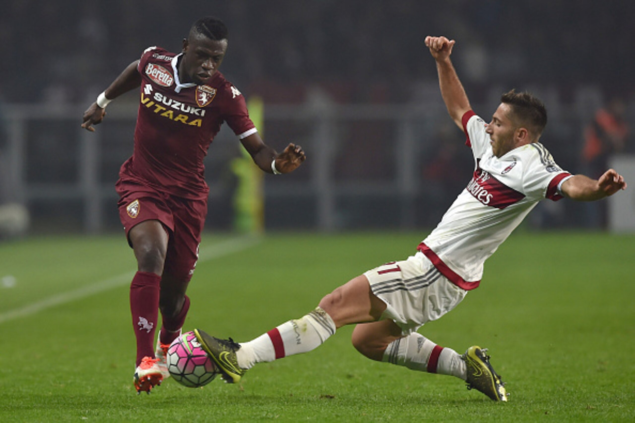 TURIN, ITALY - OCTOBER 17: Afriyie Acquah (L) of Torino FC is tackled by Andrea Bertolacci of AC Milan during the Serie A match between Torino FC and AC Milan at Stadio Olimpico di Torino on October 17, 2015 in Turin, Italy. (Photo by Valerio Pennicino/ TURIN, ITALY - OCTOBER 17: Afriyie Acquah (L) of Torino FC is tackled by Andrea Bertolacci of AC Milan during the Serie A match between Torino FC and AC Milan at Stadio Olimpico di Torino on October 17, 2015 in Turin, Italy. (Photo by Valerio Pennicino/