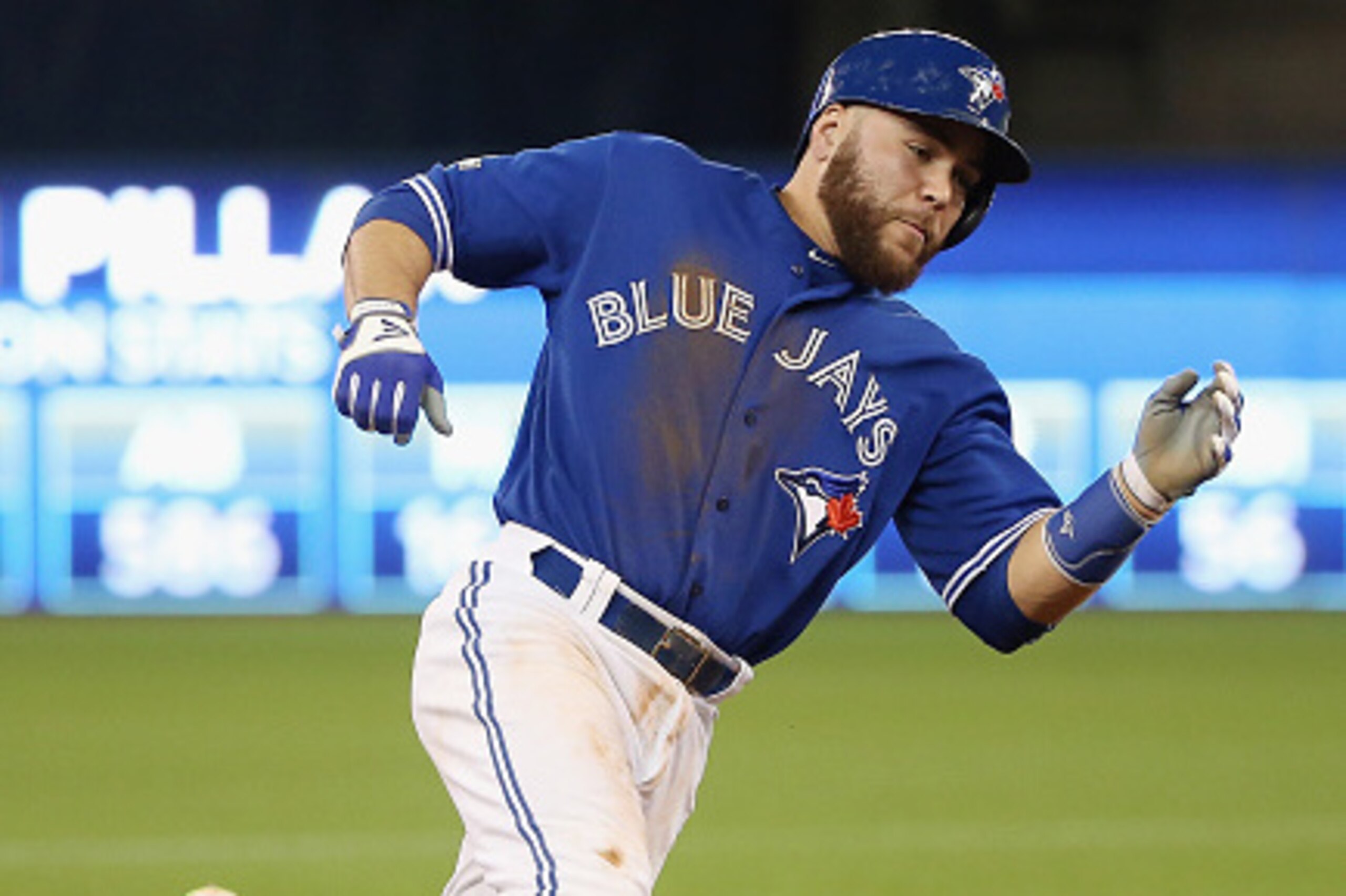 TORONTO, ON - OCTOBER 19: Russell Martin #55 of the Toronto Blue Jays rounds third base on his way to scoring a run in the third inning against the Kansas City Royals during game three of the American League Championship Series at Rogers Centre on Octobe TORONTO, ON - OCTOBER 19: Russell Martin #55 of the Toronto Blue Jays rounds third base on his way to scoring a run in the third inning against the Kansas City Royals during game three of the American League Championship Series at Rogers Centre on Octobe