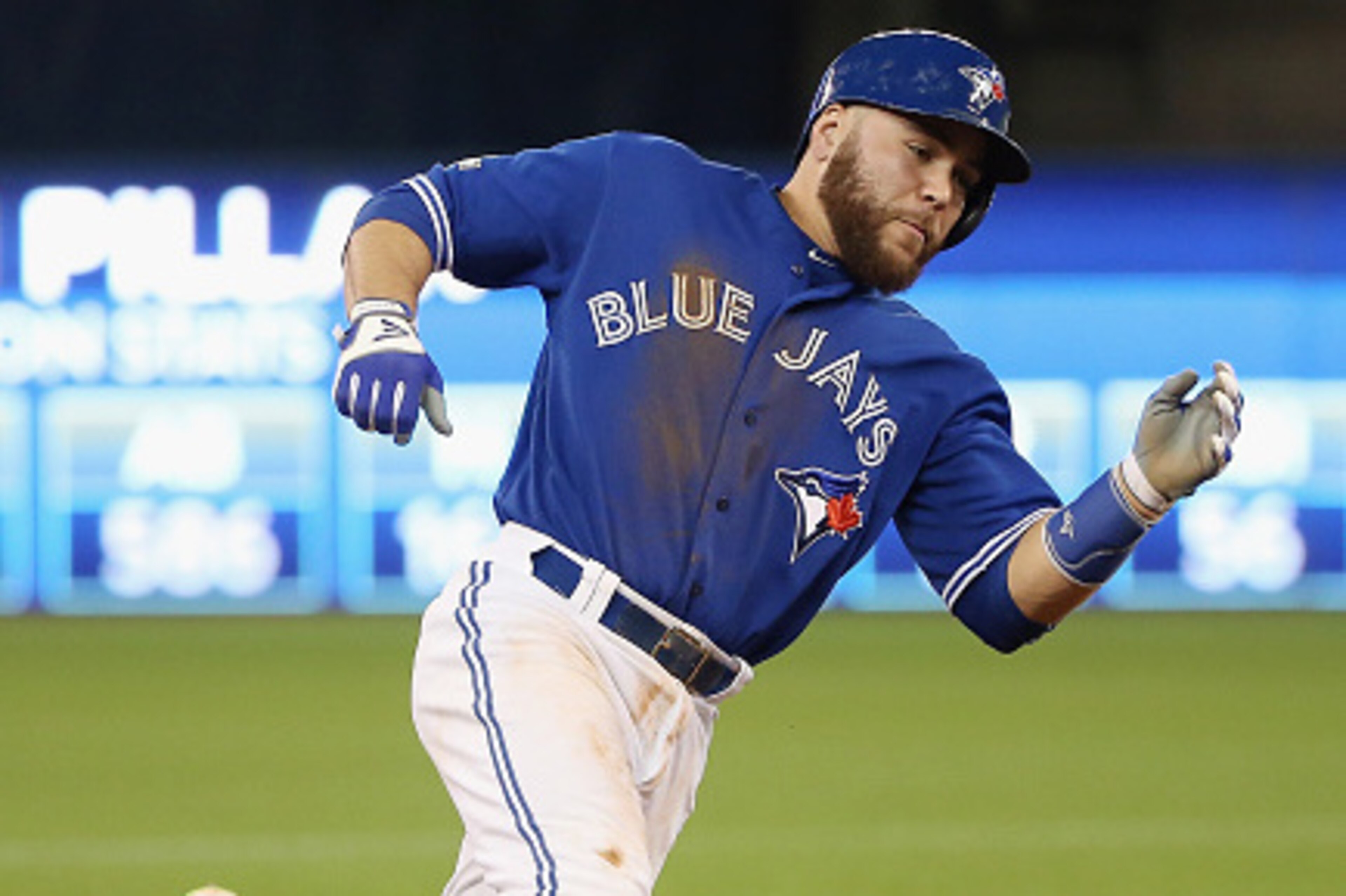 TORONTO, ON - OCTOBER 19:  Russell Martin #55 of the Toronto Blue Jays rounds third base on his way to scoring a run in the third inning against the Kansas City Royals during game three of the American League Championship Series at Rogers Centre on Octobe