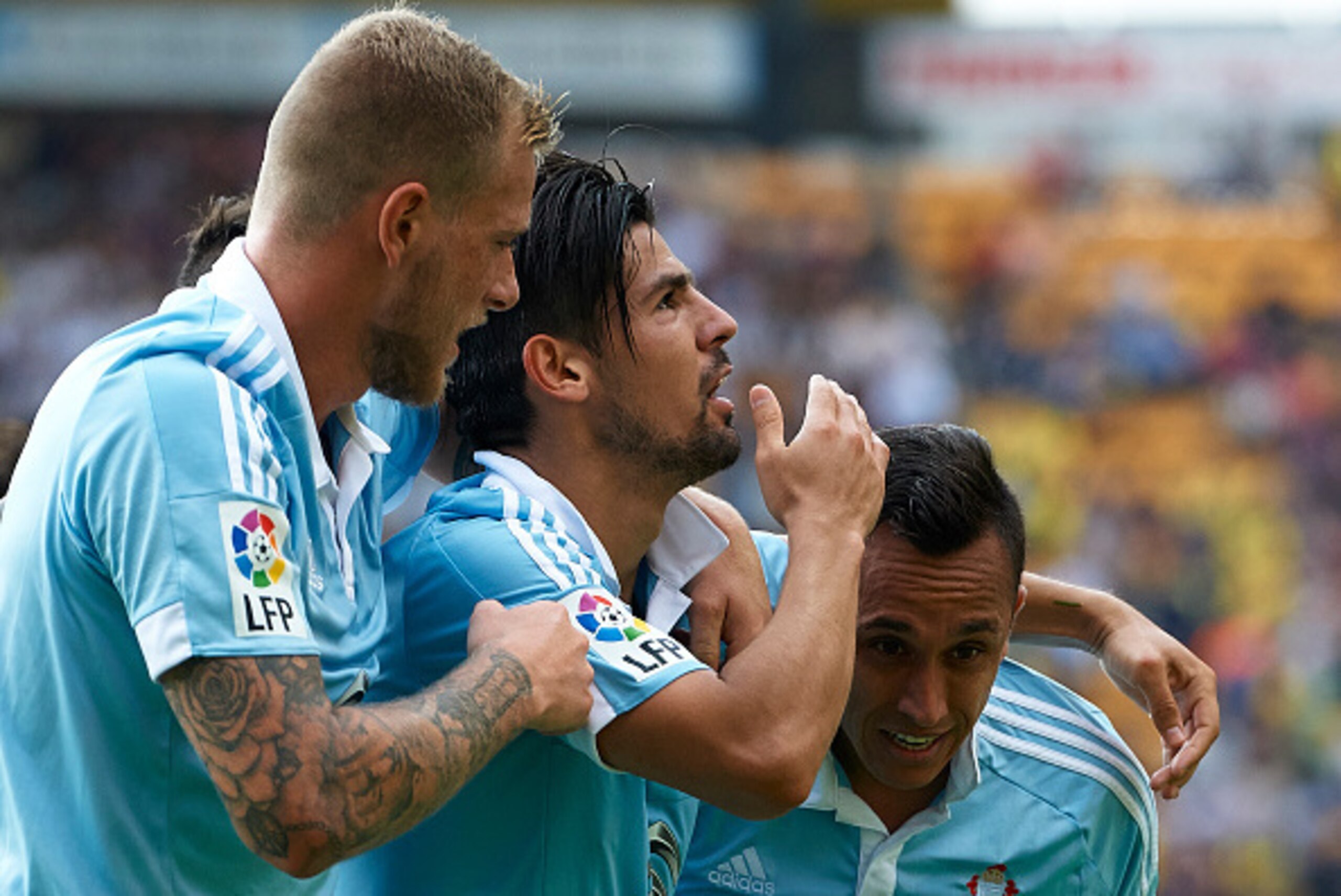 VILLARREAL, SPAIN - OCTOBER 18: Nolito of Celta celebrates scoring his team's second goal with his teammates Fabian Orellana (R) and John Guidetti (L) during the La Liga match between Villarreal CF and RC Celta de Vigo at El Madrigal Stadium on October 1 VILLARREAL, SPAIN - OCTOBER 18: Nolito of Celta celebrates scoring his team's second goal with his teammates Fabian Orellana (R) and John Guidetti (L) during the La Liga match between Villarreal CF and RC Celta de Vigo at El Madrigal Stadium on October 1