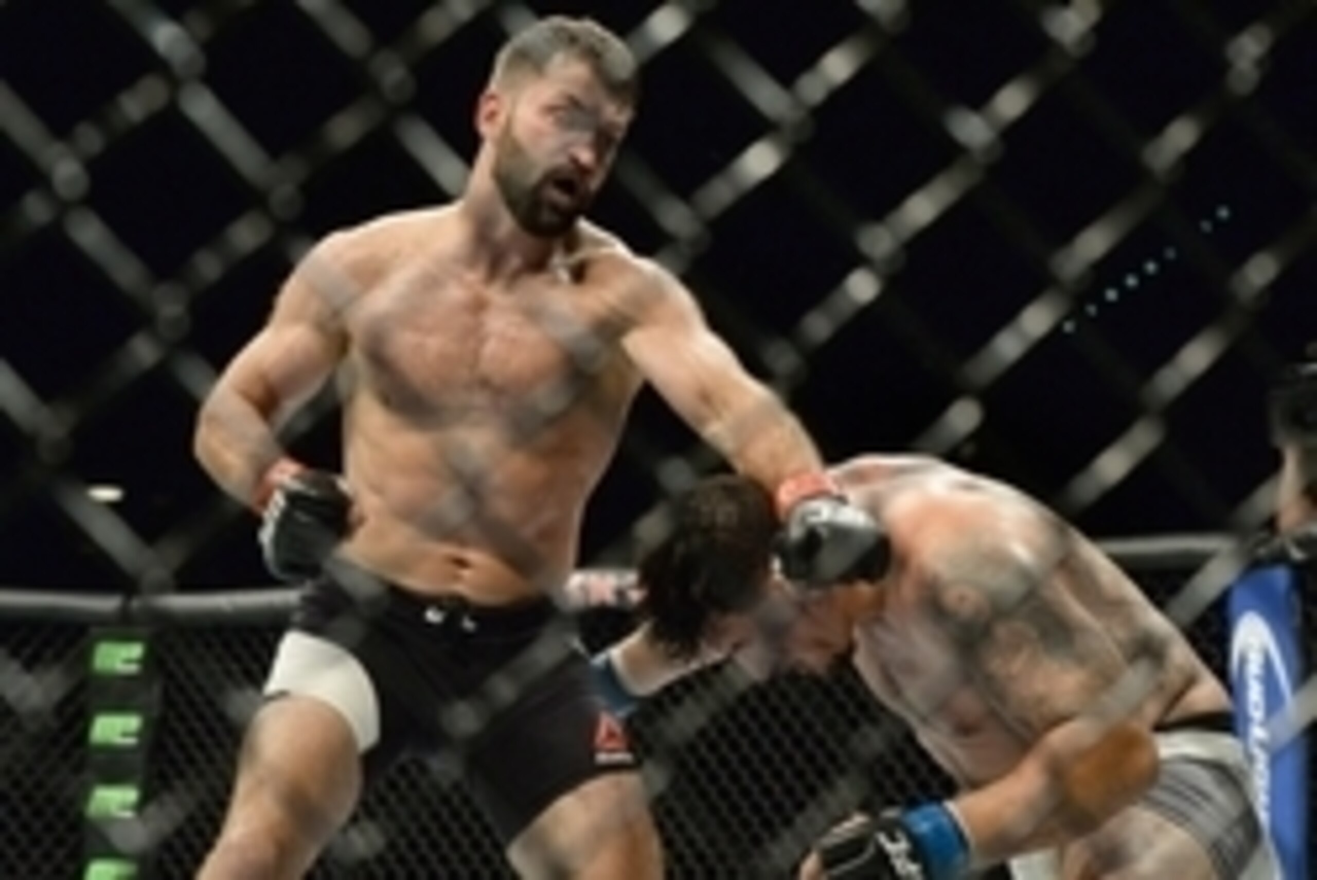 Sep 5, 2015; Las Vegas, NV, USA; Frank Mir (blue gloves) and Andrei Arlovski (red gloves) during their heavyweight bout at UFC 191 at MGM Grand Garden Arena. Mandatory Credit: Jayne Kamin-Oncea-USA TODAY Sports Sep 5, 2015; Las Vegas, NV, USA; Frank Mir (blue gloves) and Andrei Arlovski (red gloves) during their heavyweight bout at UFC 191 at MGM Grand Garden Arena. Mandatory Credit: Jayne Kamin-Oncea-USA TODAY Sports