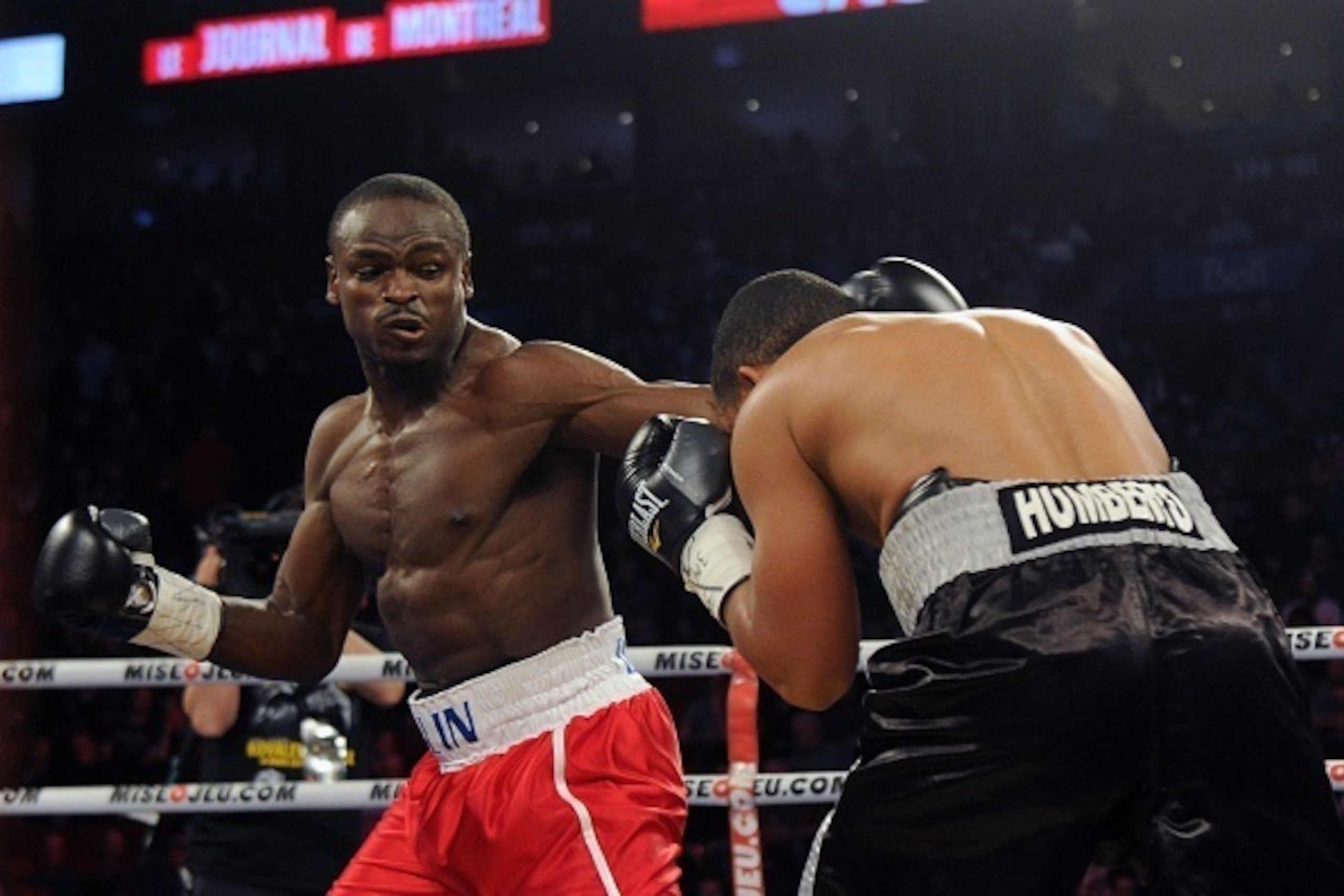MONTREAL, QC - MARCH 14: Dierry Jean (left) connects with a punch on Carlos Manuel Reyes during the undercard fight prior to the Sergey Kovalev versus Jean Pascal main event at the Bell Centre on March 14, 2015 in Montreal, Quebec, Canada. (Photo by Ric MONTREAL, QC - MARCH 14: Dierry Jean (left) connects with a punch on Carlos Manuel Reyes during the undercard fight prior to the Sergey Kovalev versus Jean Pascal main event at the Bell Centre on March 14, 2015 in Montreal, Quebec, Canada. (Photo by Ric