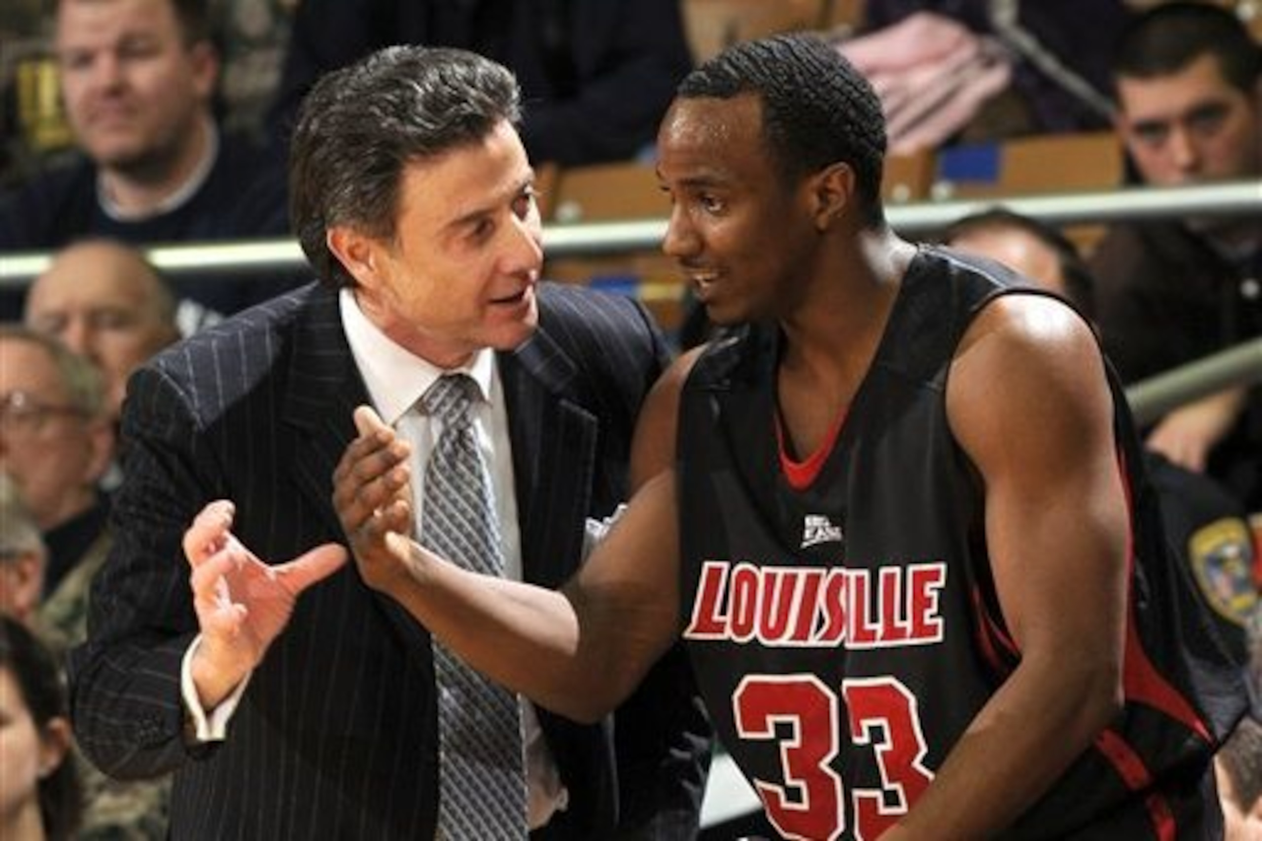 Rick Pitino told ESPN and Yahoo Sports that he wants former graduate assistant Andre McGee (right) to "tell the truth" of what happened.