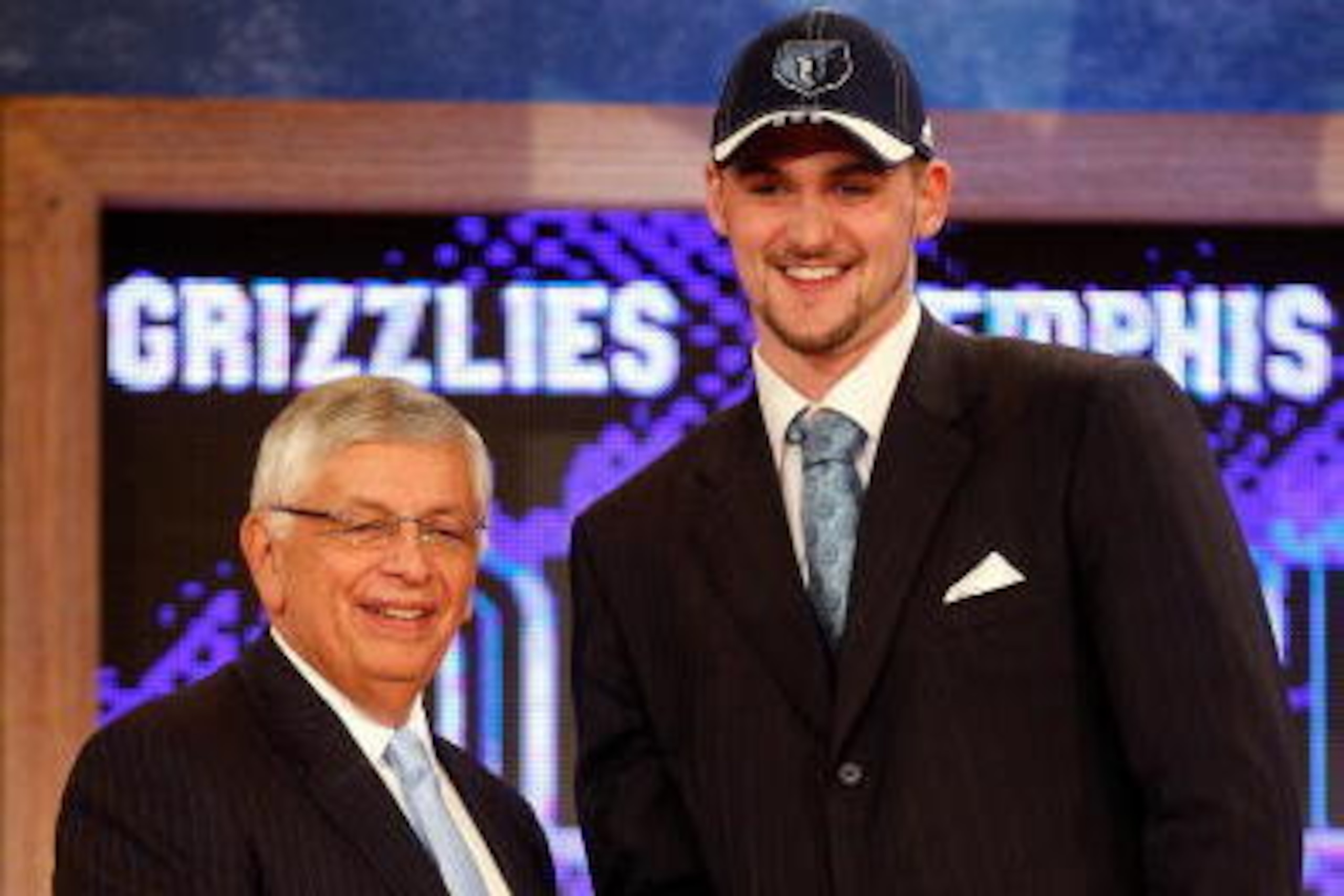 NEW YORK - JUNE 26:  NBA Commissioner David Stern shakes hands with number five draft pick for the Memphis Grizzlies, Kevin Love during the 2008 NBA Draft at the Wamu Theatre at Madison Square Garden June 26, 2008 in New York City. NOTE TO USER: User expr