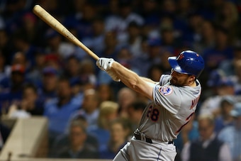 October 20, 2015; Chicago, IL, USA; New York Mets second baseman Daniel Murphy (28) hits a two run home run in the eighth inning against the Chicago Cubs in game four of the NLCS at Wrigley Field. Mandatory Credit: Jerry Lai-USA TODAY Sports