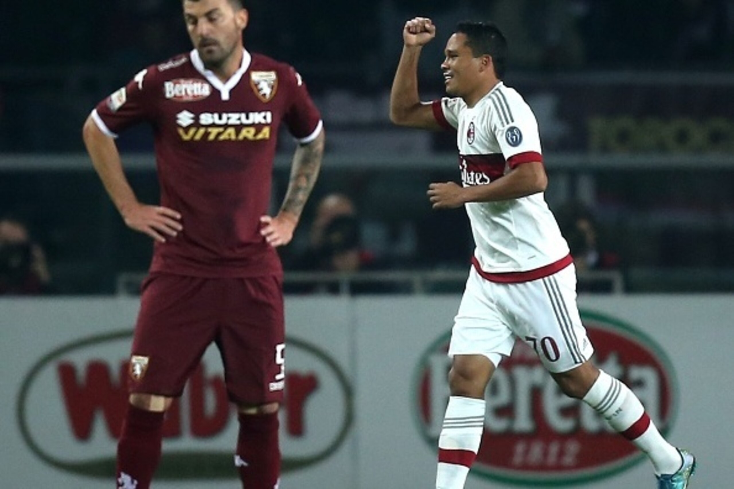 AC Milan's forward Carlos Bacca from Colombia celebrates after scoring during the Italian Serie A football match Torino Vs AC Milan on October 17, 2015 at the 'Olympic Stadium' in Turin. AFP PHOTO / MARCO BERTORELLO (Photo credit should read MARCO AC Milan's forward Carlos Bacca from Colombia celebrates after scoring during the Italian Serie A football match Torino Vs AC Milan on October 17, 2015 at the 'Olympic Stadium' in Turin. AFP PHOTO / MARCO BERTORELLO (Photo credit should read MARCO