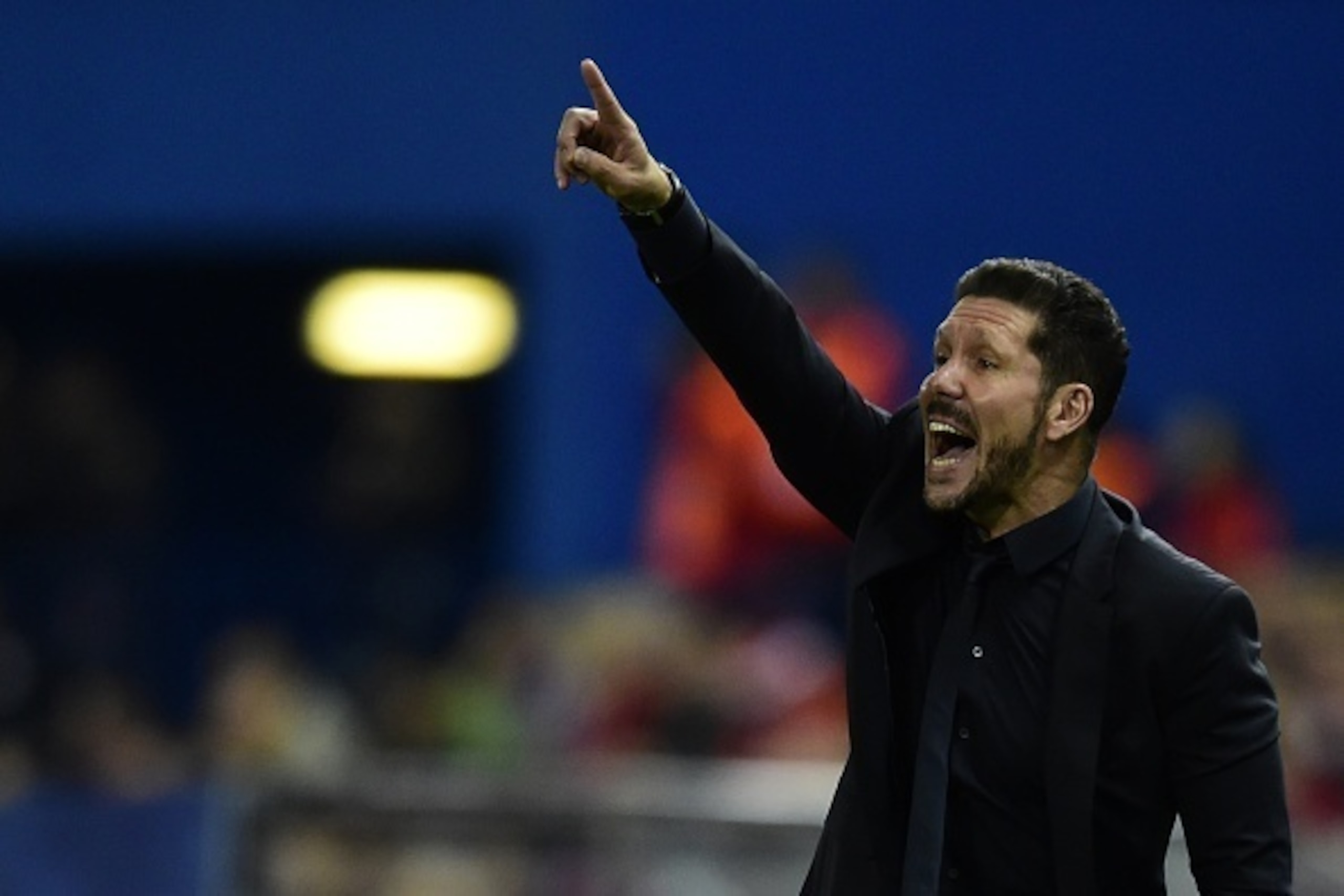 Atletico Madrid's Argentinian coach Diego Simeone gestures during the UEFA Champions League group C football match Club Atletico de Madrid vs FC Astana at the Vicente Calderon stadium in Madrid on October 21, 2015.   AFP PHOTO/ JAVIER SORIANO        (Phot