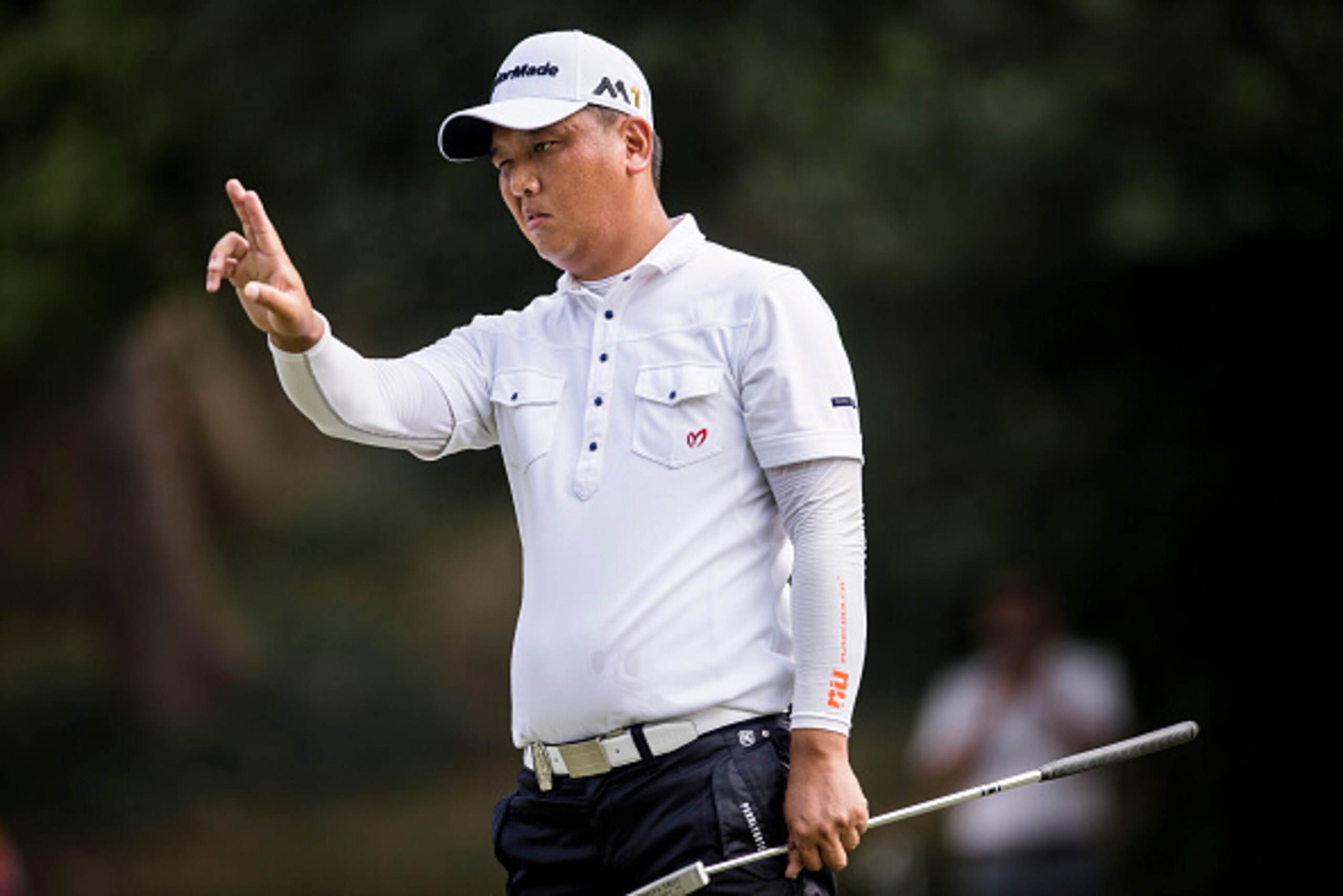 HONG KONG - OCTOBER 22: Lu Wei-chih of Taiwan lines up a putt on the 15th green during the first round of the UBS Hong Kong Open at the Hong Kong Golf Club on October 22, 2015 in Hong Kong, Hong Kong. (Photo by Victor Fraile/Getty Images) HONG KONG - OCTOBER 22: Lu Wei-chih of Taiwan lines up a putt on the 15th green during the first round of the UBS Hong Kong Open at the Hong Kong Golf Club on October 22, 2015 in Hong Kong, Hong Kong. (Photo by Victor Fraile/Getty Images)