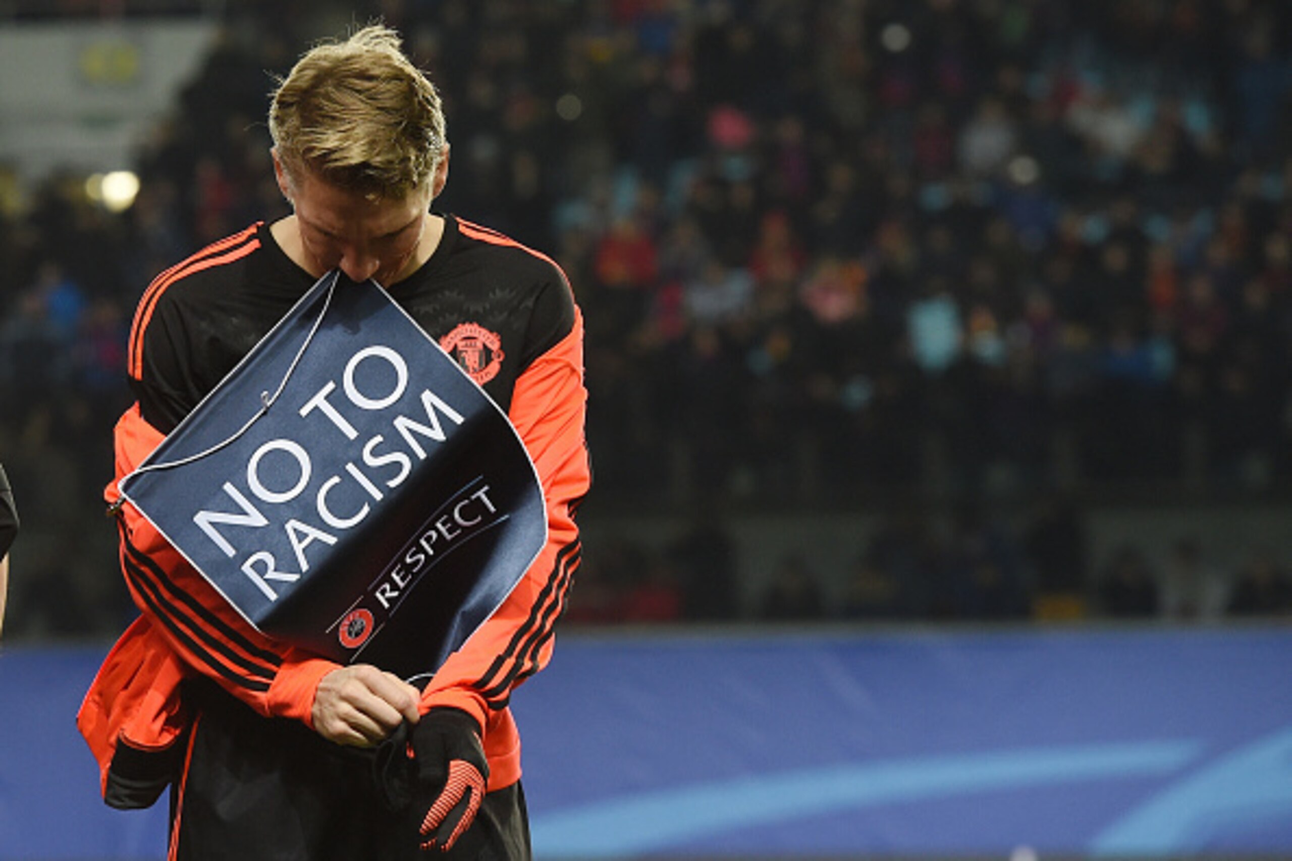 KHIMKI, RUSSIA - OCTOBER 21: Bastian Schweinsteiger of Manchester United FC keeps pennant  No to Racism before the UEFA Champions League Group B match between CSKA Moscow and Manchester United FC at the Arena Khimki Stadium on October 21, 2015 in Moscow, 