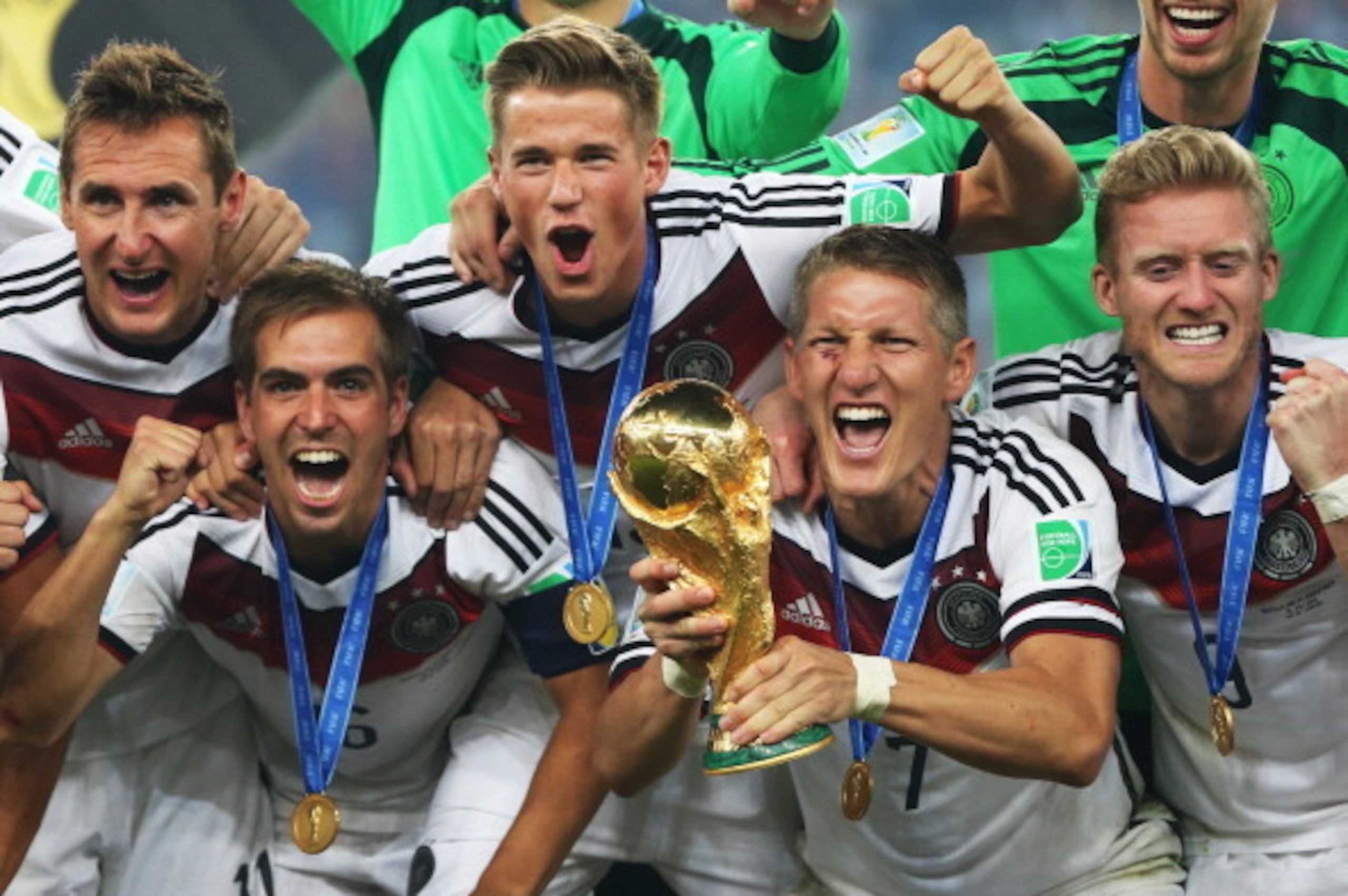 RIO DE JANEIRO, BRAZIL - JULY 13:  Bastian Schweinsteiger of Germany holds the trophy during the 2014 World Cup final match between Germany and Argentina at The Maracana Stadium on July 13, 2014 in Rio de Janeiro, Brazil. (Photo by Ian MacNicol/Getty Imag