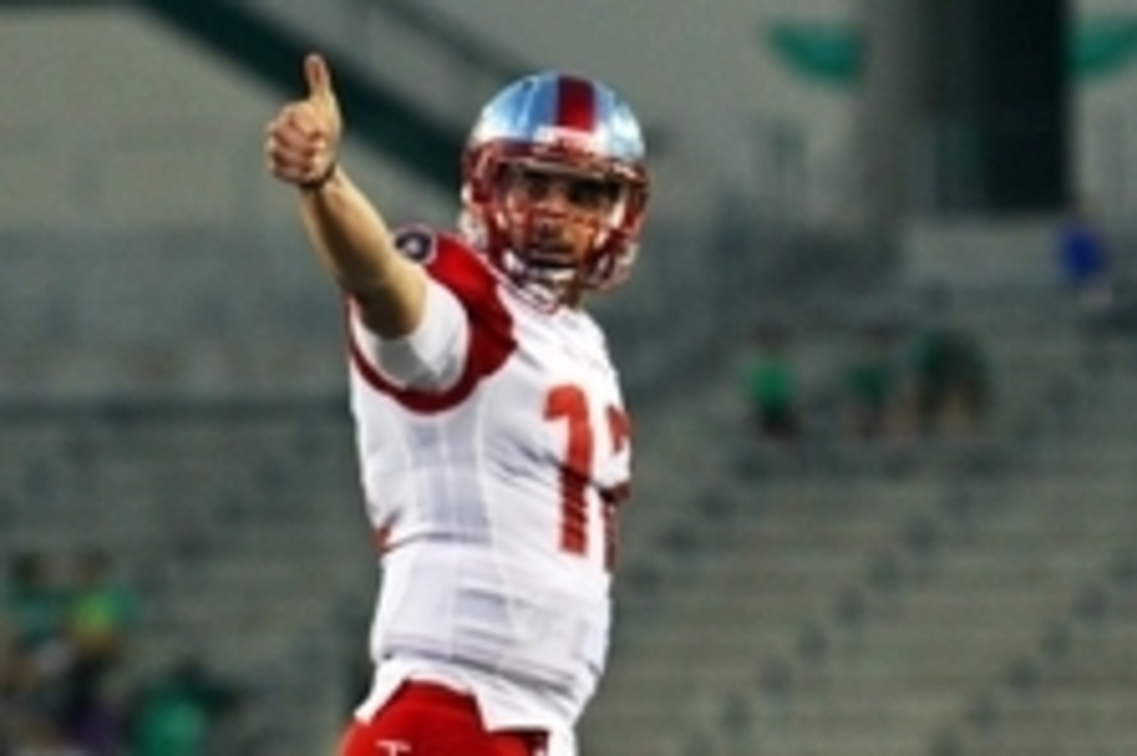 Oct 15, 2015; Denton, TX, USA; Western Kentucky Hilltoppers quarterback Brandon Doughty (12) reacts after throwing his 2nd touchdown of the game against the North Texas Mean Green during the first quarter of game at Apogee Stadium. Mandatory Credit: Ray C