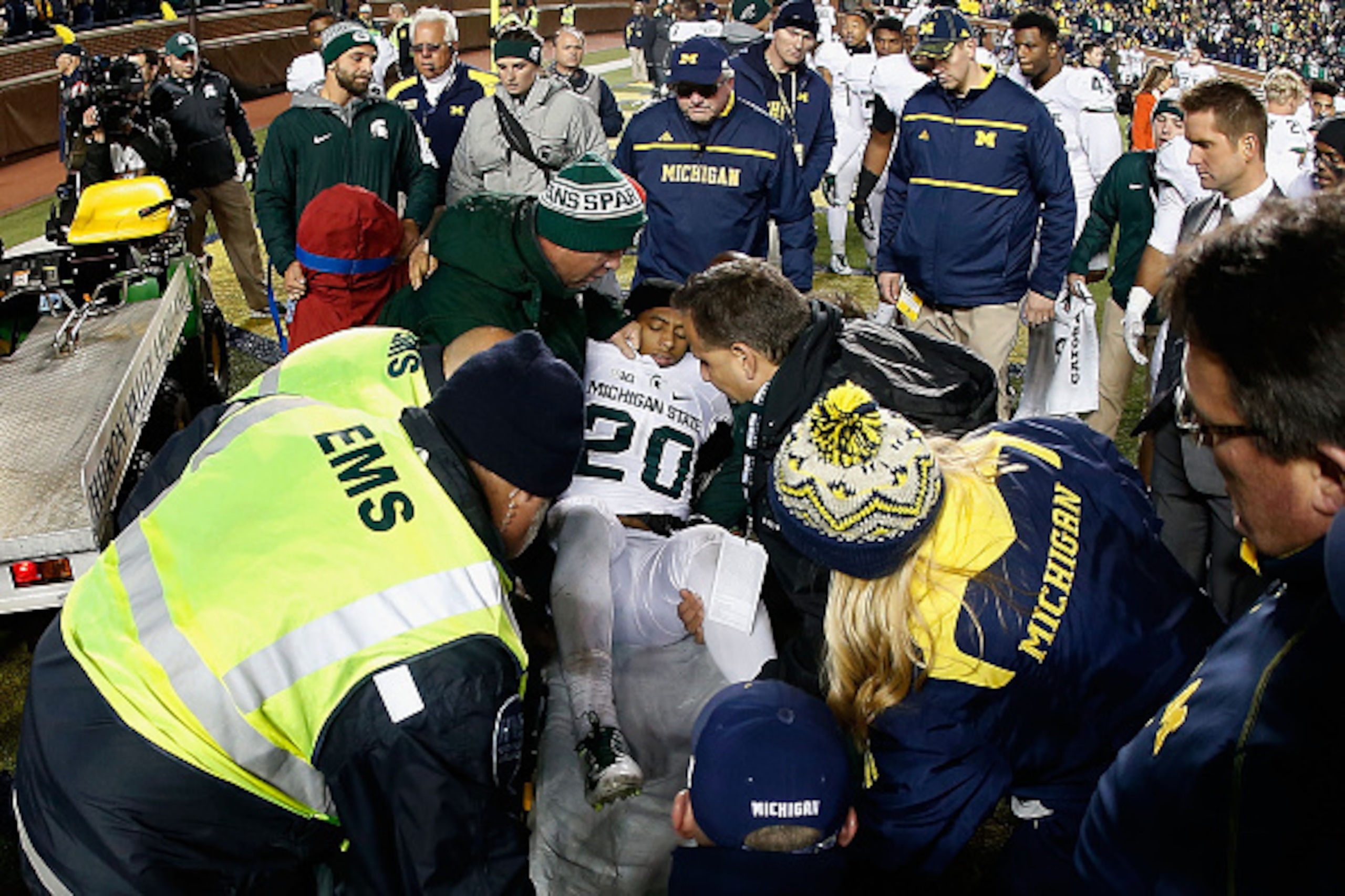 ANN ARBOR, MI - OCTOBER 17:  Defensive back Jalen Watts-Jackson #20 of the Michigan State Spartans is lifted onto a stretcher after being injured on his game winning 38 yard touchdown against the Michigan Wolverines following the college football game at 