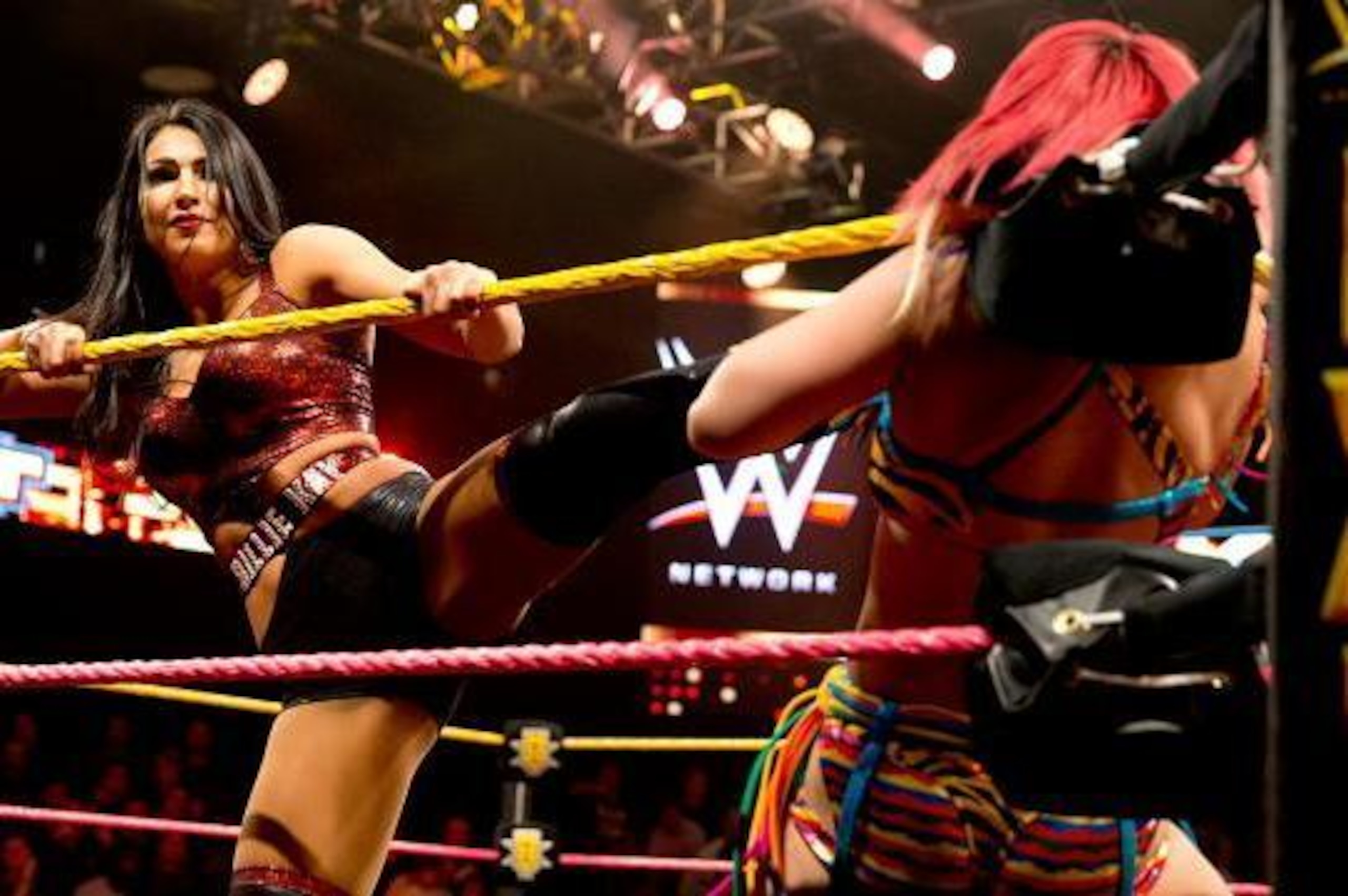 Billie Kay in control of Asuka. Billie Kay in control of Asuka.