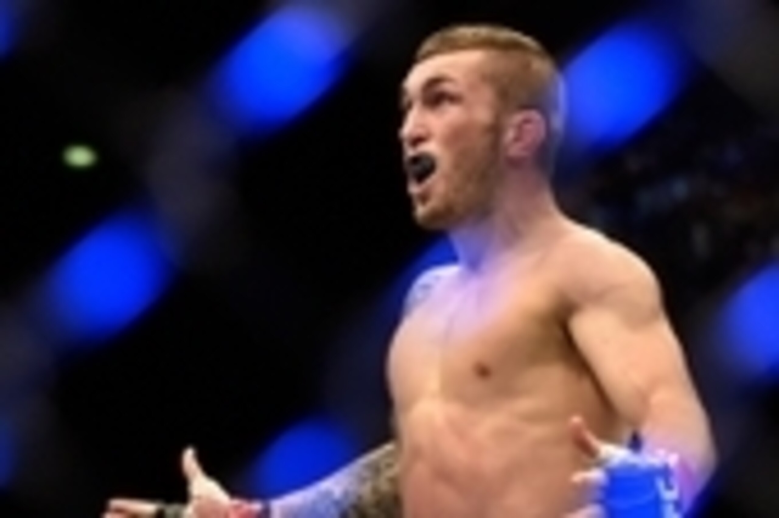Jul 18, 2015; Glasgow, Lanarkshire, Scotland; Stevie Ray (Scotland)  celebrates victory in his Lightweight bout against  Leonardo Mafra (Brazil) at The SSE Hydro. Mandatory Credit: Steve Flynn-USA TODAY Sports