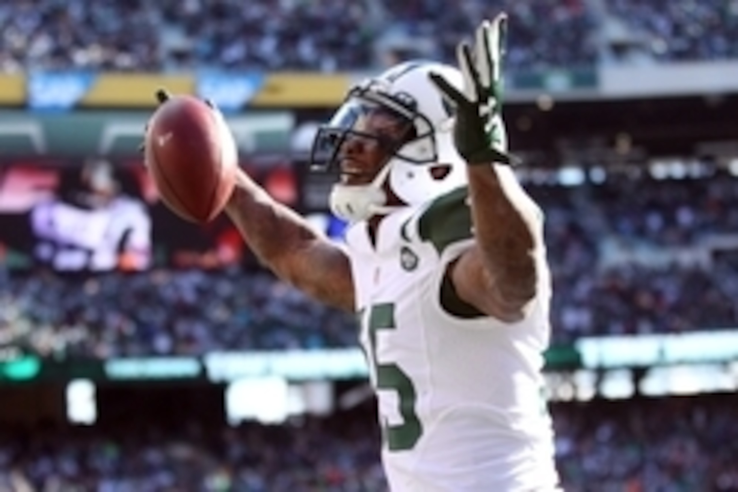 Oct 18, 2015; East Rutherford, NJ, USA; New York Jets wide receiver Brandon Marshall (15) celebrates after scoring a touchdown against the Washington Redskins during the third quarter at MetLife Stadium. Mandatory Credit: Brad Penner-USA TODAY Sports