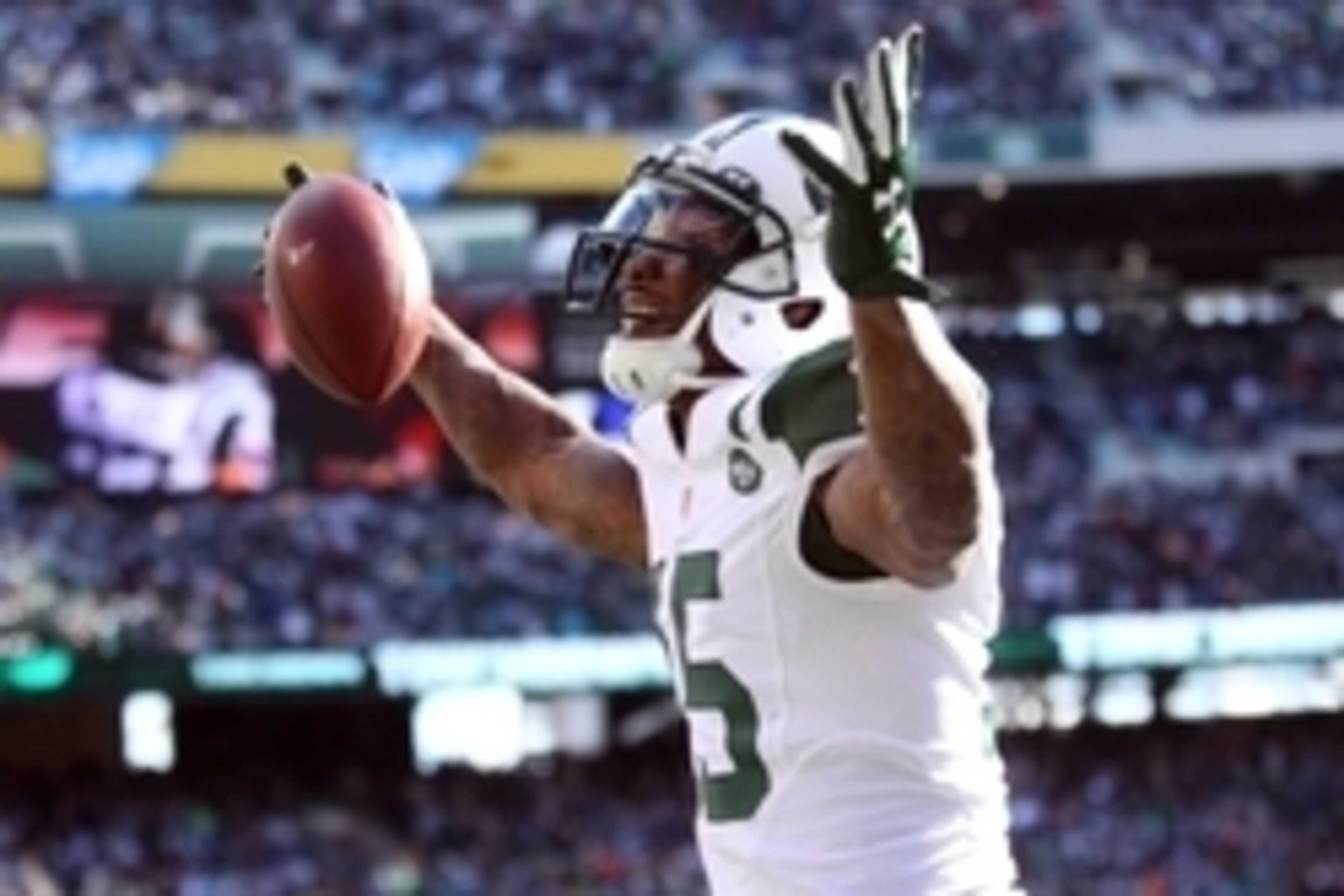 Oct 18, 2015; East Rutherford, NJ, USA; New York Jets wide receiver Brandon Marshall (15) celebrates after scoring a touchdown against the Washington Redskins during the third quarter at MetLife Stadium. Mandatory Credit: Brad Penner-USA TODAY Sports