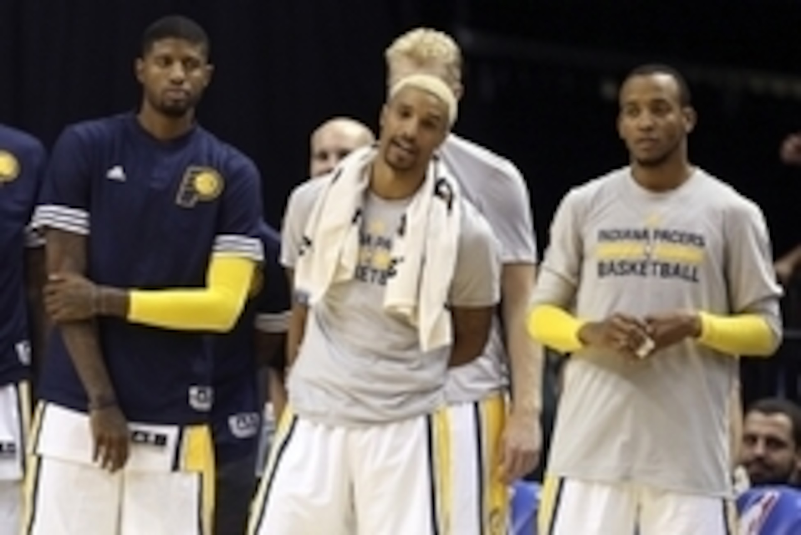Oct 13, 2015; Indianapolis, IN, USA; From left to right Indiana Pacers forward Paul George, guard George Hill, and guard Monta Ellis watch from the sidelines during a game against the Detroit Pistons at Bankers Life Fieldhouse. Indiana defeats Detroit 101