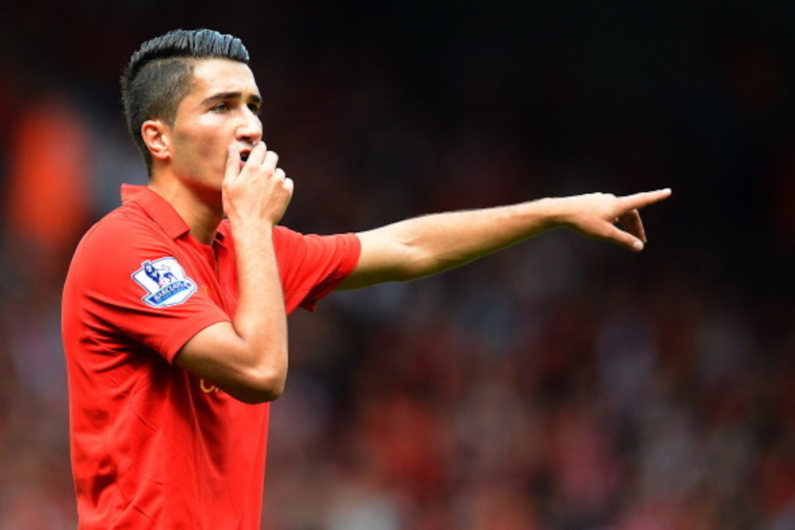 Liverpool's Turkish midfielder Nuri Sahin reacts during the English Premier League football match between Liverpool and Arsenal at Anfield in Liverpool, north-west England on September 2, 2012.    AFP PHOTO/ ANDREW YATES
RESTRICTED TO EDITORIAL USE. No us