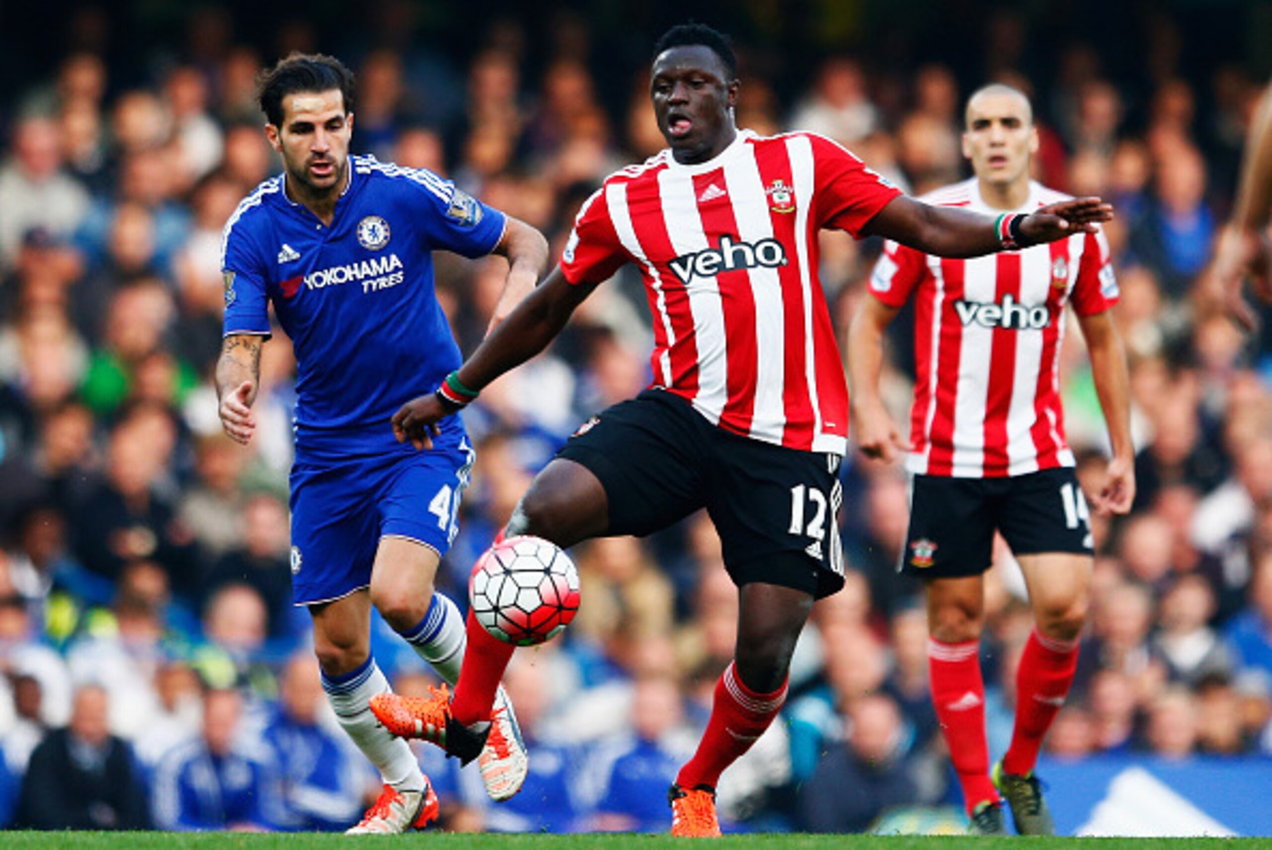 LONDON, ENGLAND - OCTOBER 03: Victor Wanyama of Southampton and Sesc Fabregas of Chelsea compete for the ball during the Barclays Premier League match between Chelsea and Southampton at Stamford Bridge on October 3, 2015 in London, United Kingdom. (Phot LONDON, ENGLAND - OCTOBER 03: Victor Wanyama of Southampton and Sesc Fabregas of Chelsea compete for the ball during the Barclays Premier League match between Chelsea and Southampton at Stamford Bridge on October 3, 2015 in London, United Kingdom. (Phot