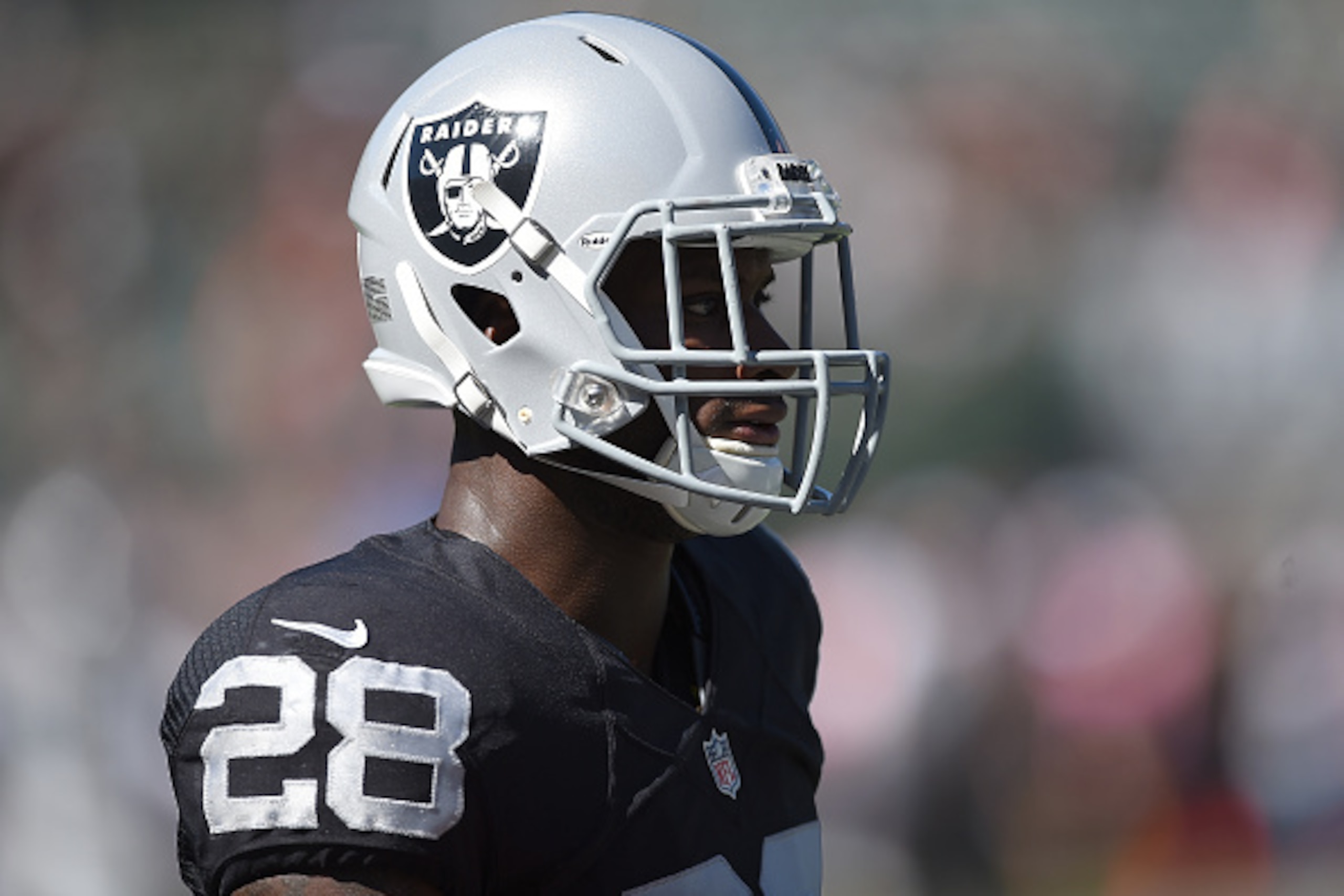 OAKLAND, CA - OCTOBER 11:  Latavius Murray #28 of the Oakland Raiders looks on during pregame warm ups prior to playing the Denver Broncos at the O.co Coliseum on October 11, 2015 in Oakland, California.  (Photo by Thearon W. Henderson/Getty Images)