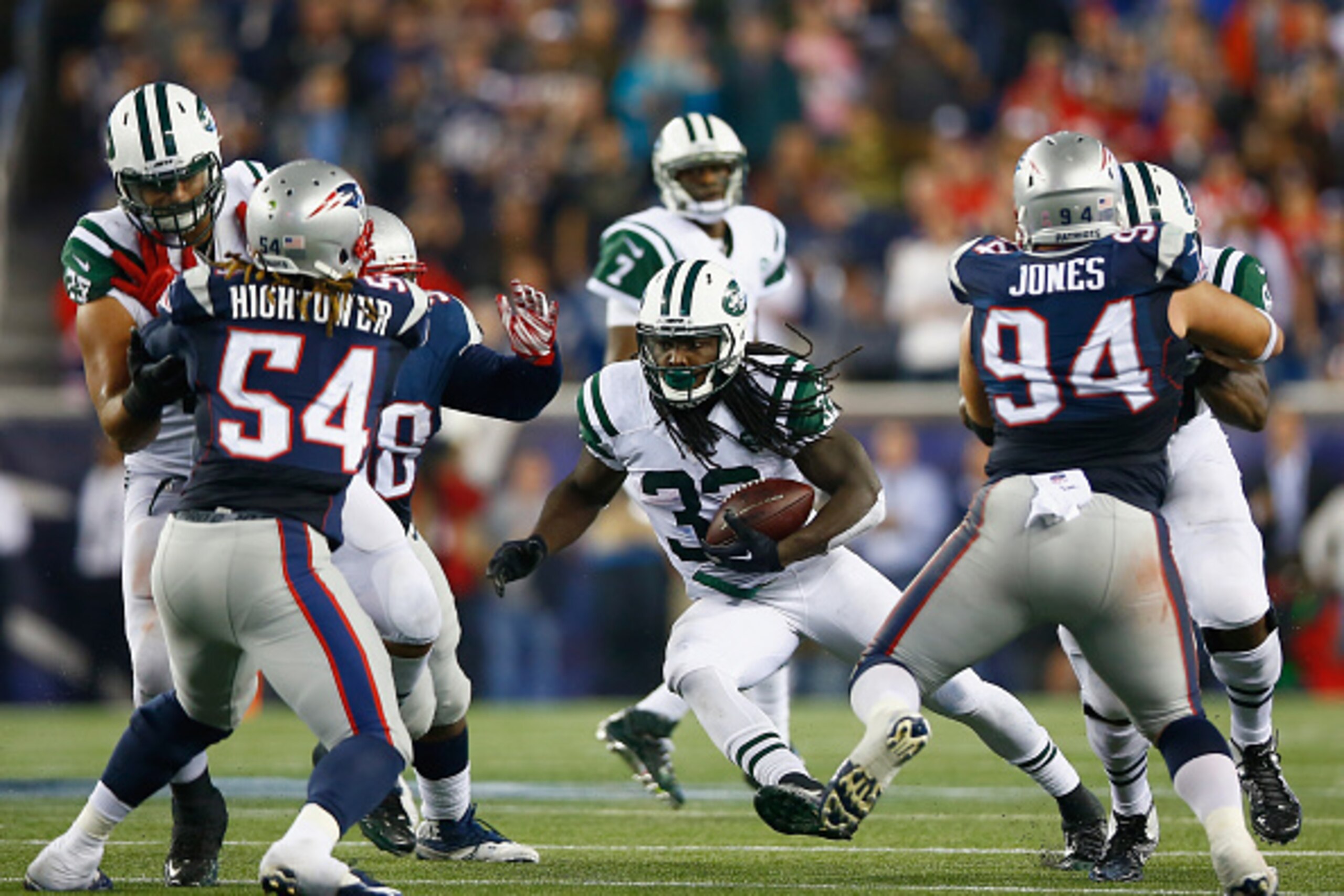 FOXBORO, MA - OCTOBER 16:  Chris Ivory #33 of the New York Jets carries the ball during the second quarter against the New England Patriots at Gillette Stadium on October 16, 2014 in Foxboro, Massachusetts.  (Photo by Jared Wickerham/Getty Images)