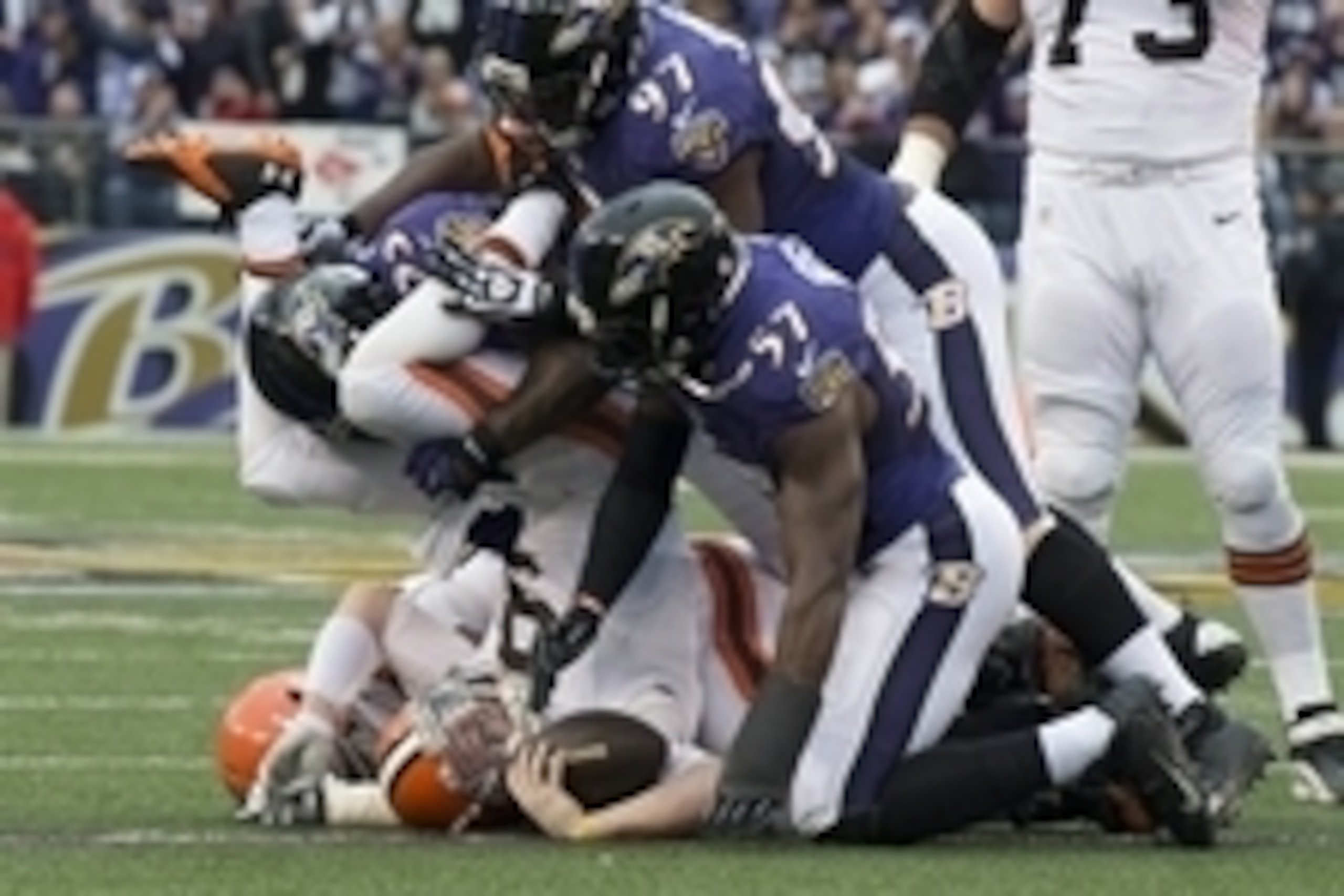 Dec 28, 2014; Baltimore, MD, USA; Cleveland Browns quarterback Connor Shaw (9) is sacked by Baltimore Ravens outside linebacker Terrell Suggs (55), defensive end Timmy Jernigan (97) and inside linebacker C.J. Mosley (57) during the second quarter at M&T B Dec 28, 2014; Baltimore, MD, USA; Cleveland Browns quarterback Connor Shaw (9) is sacked by Baltimore Ravens outside linebacker Terrell Suggs (55), defensive end Timmy Jernigan (97) and inside linebacker C.J. Mosley (57) during the second quarter at M&T B
