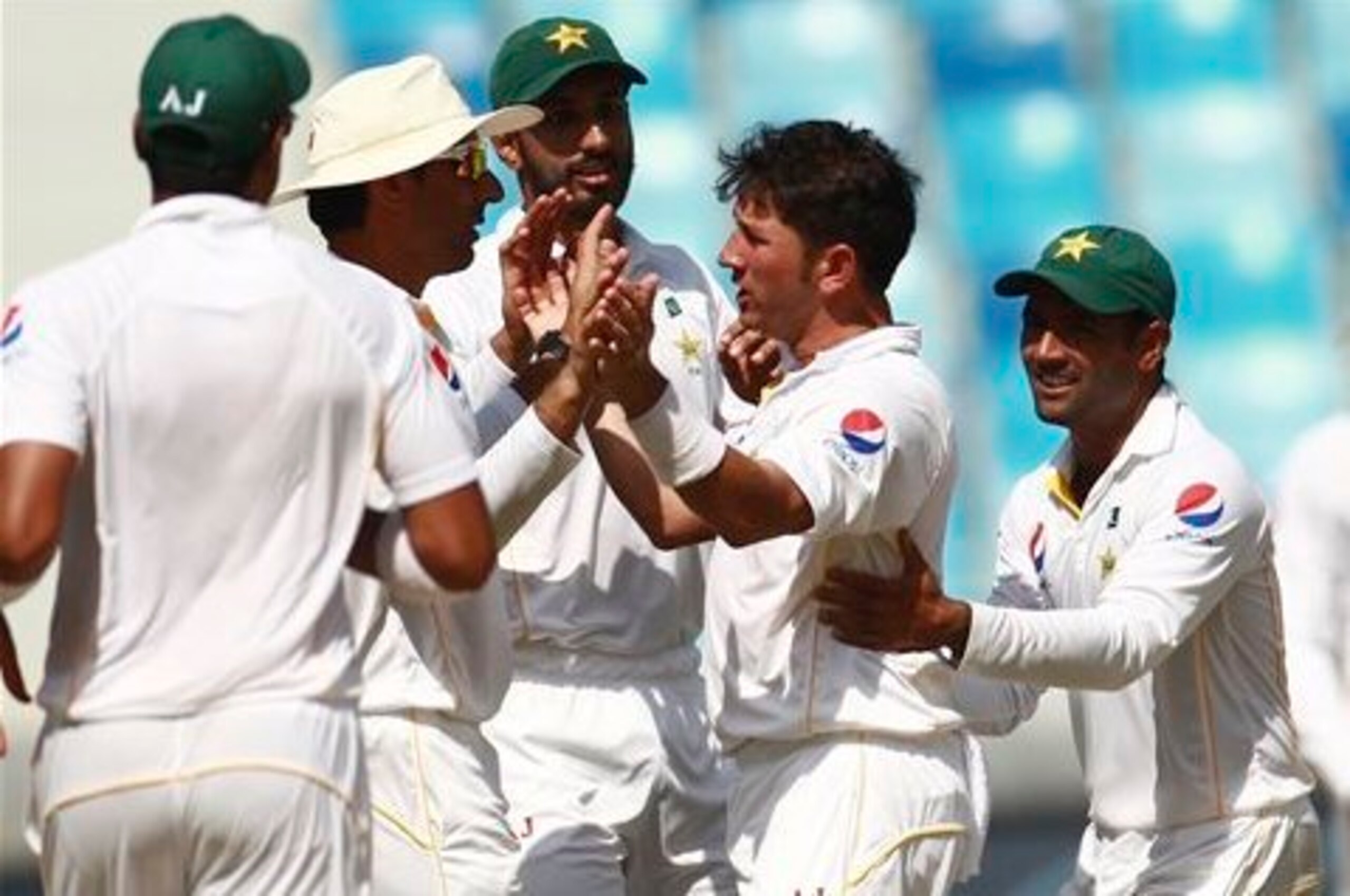 Yasir Shah celebrates one of his four wickets.