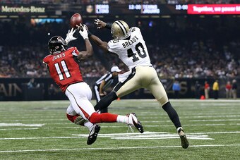 NEW ORLEANS, LA - OCTOBER 15:  Delvin Breaux #40 of the New Orleans Saints defends a pass intended for Julio Jones #11 of the Atlanta Falcons during the second quarter of a game at the Mercedes-Benz Superdome on October 15, 2015 in New Orleans, Louisiana.
