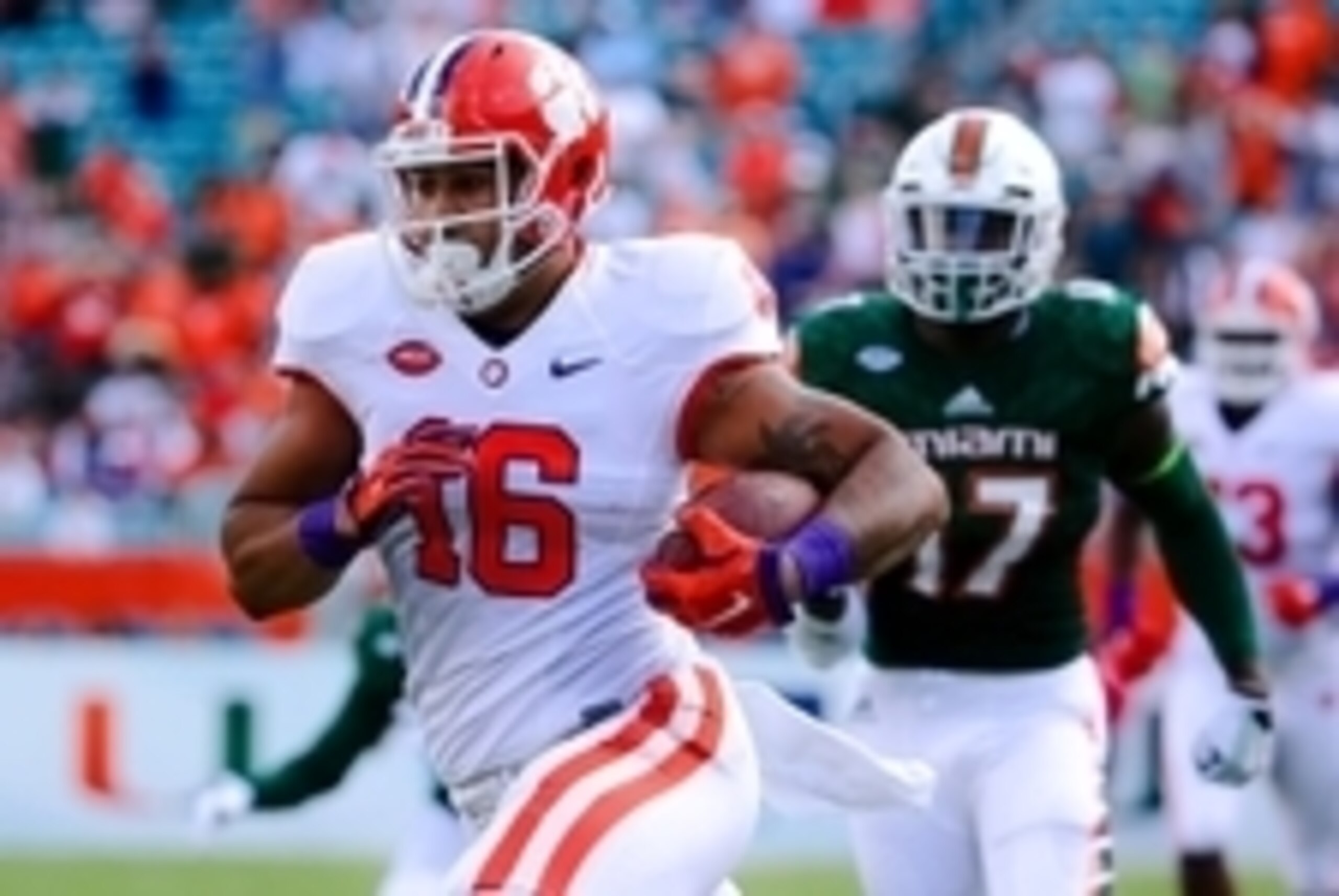 Oct 24, 2015; Miami Gardens, FL, USA; Clemson Tigers tight end Jordan Leggett (16) runs past Miami Hurricanes linebacker Tyriq McCord (17) for a touchdown during the first half at Sun Life Stadium. Mandatory Credit: Steve Mitchell-USA TODAY Sports