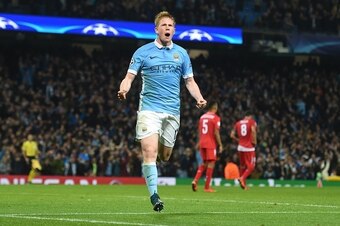 Manchester City's Belgian midfielder Kevin De Bruyne celebrates after scoring during a UEFA Champions league Group D football match between Manchester City and Sevilla at the Etihad Stadium in Manchester, north west England on October 21, 2015.          A