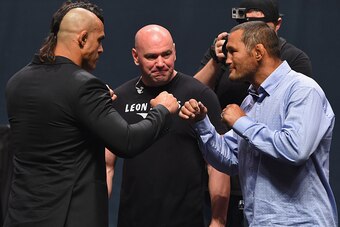 LAS VEGAS, NV - SEPTEMBER 04:  (L-R) Vitor Belfort and Dan Henderson face off during the UFC's Go Big launch event inside MGM Grand Garden Arena on September 4, 2015 in Las Vegas, Nevada.  (Photo by Josh Hedges/Zuffa LLC/Zuffa LLC via Getty Images)