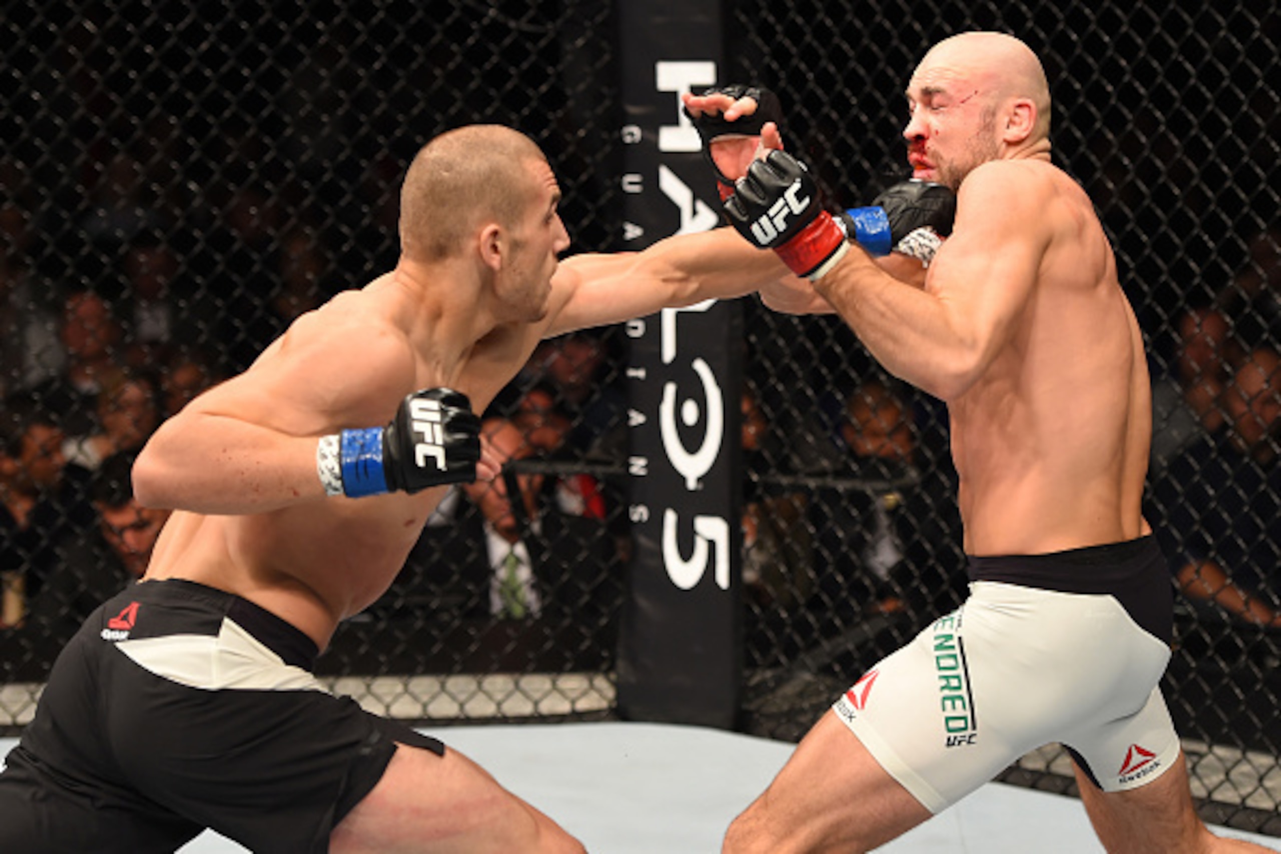 DUBLIN, IRELAND - OCTOBER 24: (L-R) Tom Breese punches Cathal Pendred in their welterweight fight during the UFC event at 3Arena on October 24, 2015 in Dublin, Ireland. (Photo by Josh Hedges/Zuffa LLC/Zuffa LLC via Getty Images) DUBLIN, IRELAND - OCTOBER 24: (L-R) Tom Breese punches Cathal Pendred in their welterweight fight during the UFC event at 3Arena on October 24, 2015 in Dublin, Ireland. (Photo by Josh Hedges/Zuffa LLC/Zuffa LLC via Getty Images)