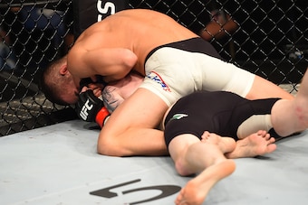 DUBLIN, IRELAND - OCTOBER 24:  Louis Smolka (top) attempts to submit Paddy Holohan in their flyweight fight during the UFC event at 3Arena on October 24, 2015 in Dublin, Ireland. (Photo by Josh Hedges/Zuffa LLC/Zuffa LLC via Getty Images)