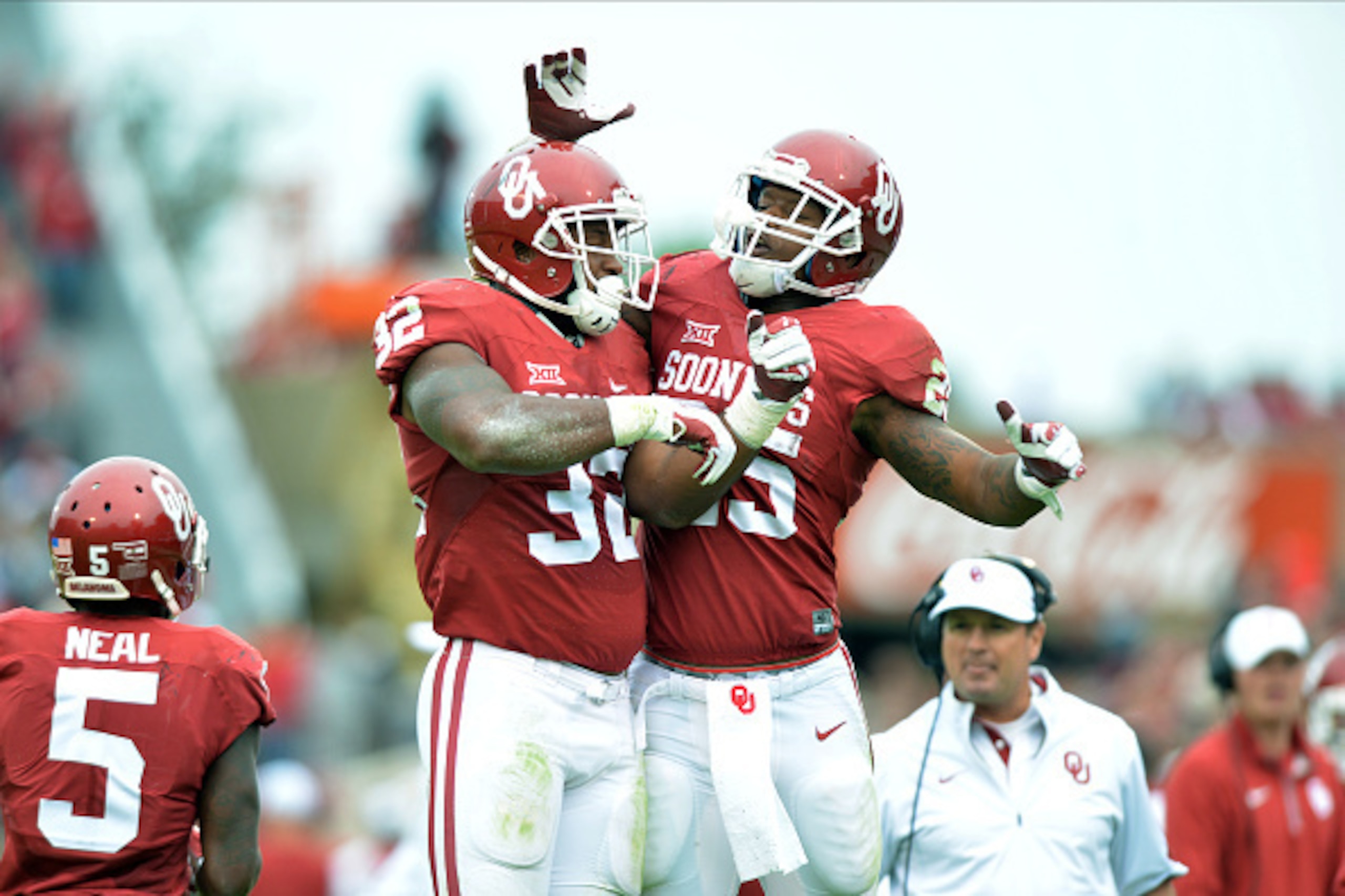 NORMAN, OK - OCTOBER 24: Running backs Samaje Perine #32 and Joe Mixon #25 of the Oklahoma Sooners celebrate a touchdown during their victory against the Texas Tech Red Raiders on October 24, 2015 at the Gaylord Family Oklahoma Memorial Stadium in Norman, NORMAN, OK - OCTOBER 24: Running backs Samaje Perine #32 and Joe Mixon #25 of the Oklahoma Sooners celebrate a touchdown during their victory against the Texas Tech Red Raiders on October 24, 2015 at the Gaylord Family Oklahoma Memorial Stadium in Norman,