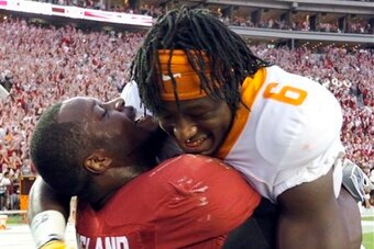 Reggie Ragland says hi to his friend and former teammate Alvin Kamara after the game.