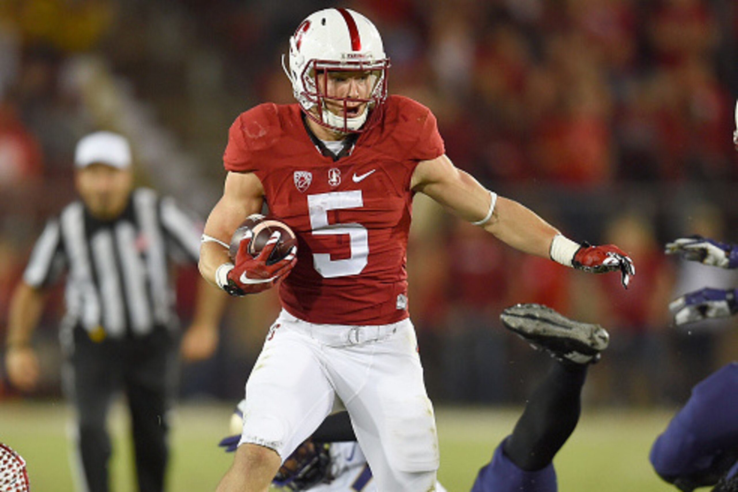 STANFORD, CA - OCTOBER 24:  Christian McCaffrey #5 of the Stanford Cardinal's rushes with the ball against the Washington Huskies in the first quarter of an NCAA football game at Stanford Stadium on October 24, 2015 in Stanford, California.  (Photo by The