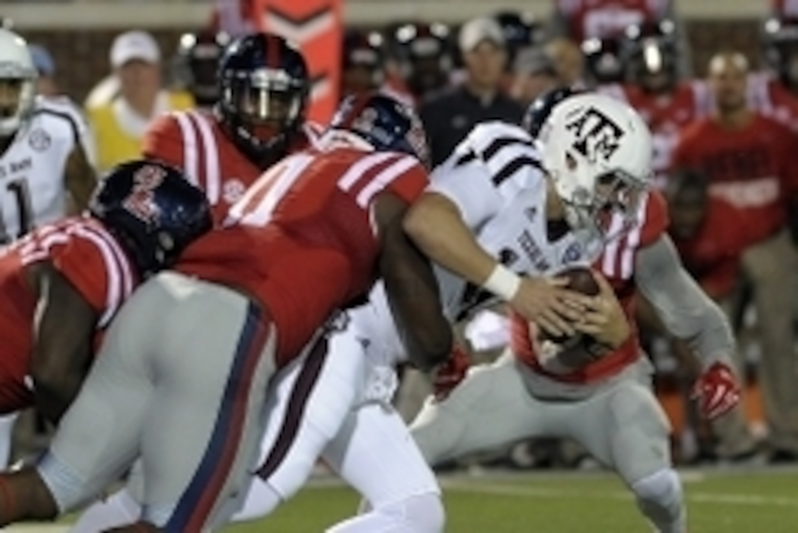 Oct 24, 2015; Oxford, MS, USA; Mississippi Rebels defensive end Channing Ward (11) tackles Texas A&M Aggies quarterback Kyle Allen (10) during the game at Vaught-Hemingway Stadium. Mandatory Credit: Justin Ford-USA TODAY Sports