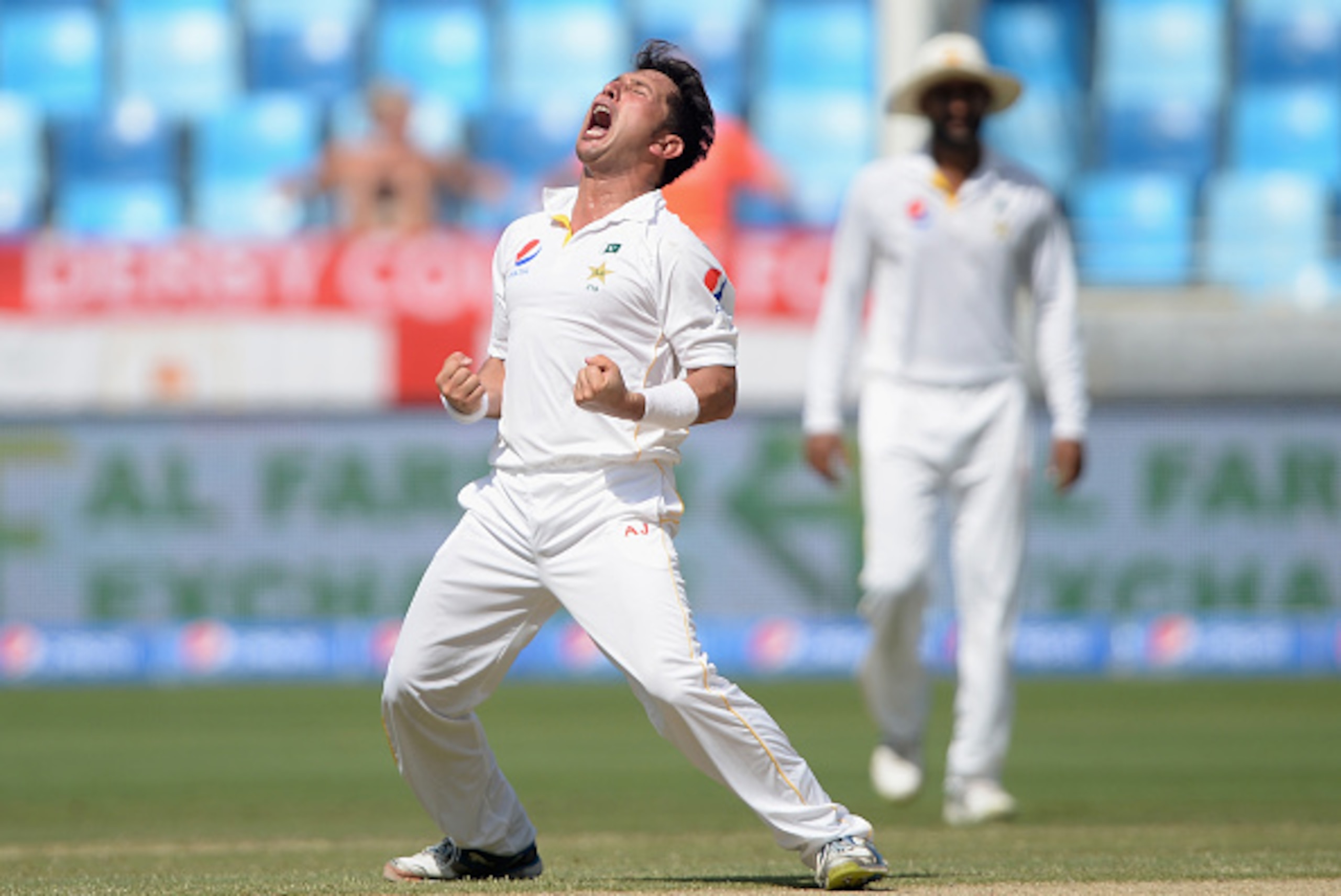 DUBAI, UNITED ARAB EMIRATES - OCTOBER 24:  Yasir Shah of Pakistan celebrates dismissing Jonathan Bairstow of England during day three of the 2nd test match between Pakistan and England at Dubai Cricket Stadium on October 24, 2015 in Dubai, United Arab Emi