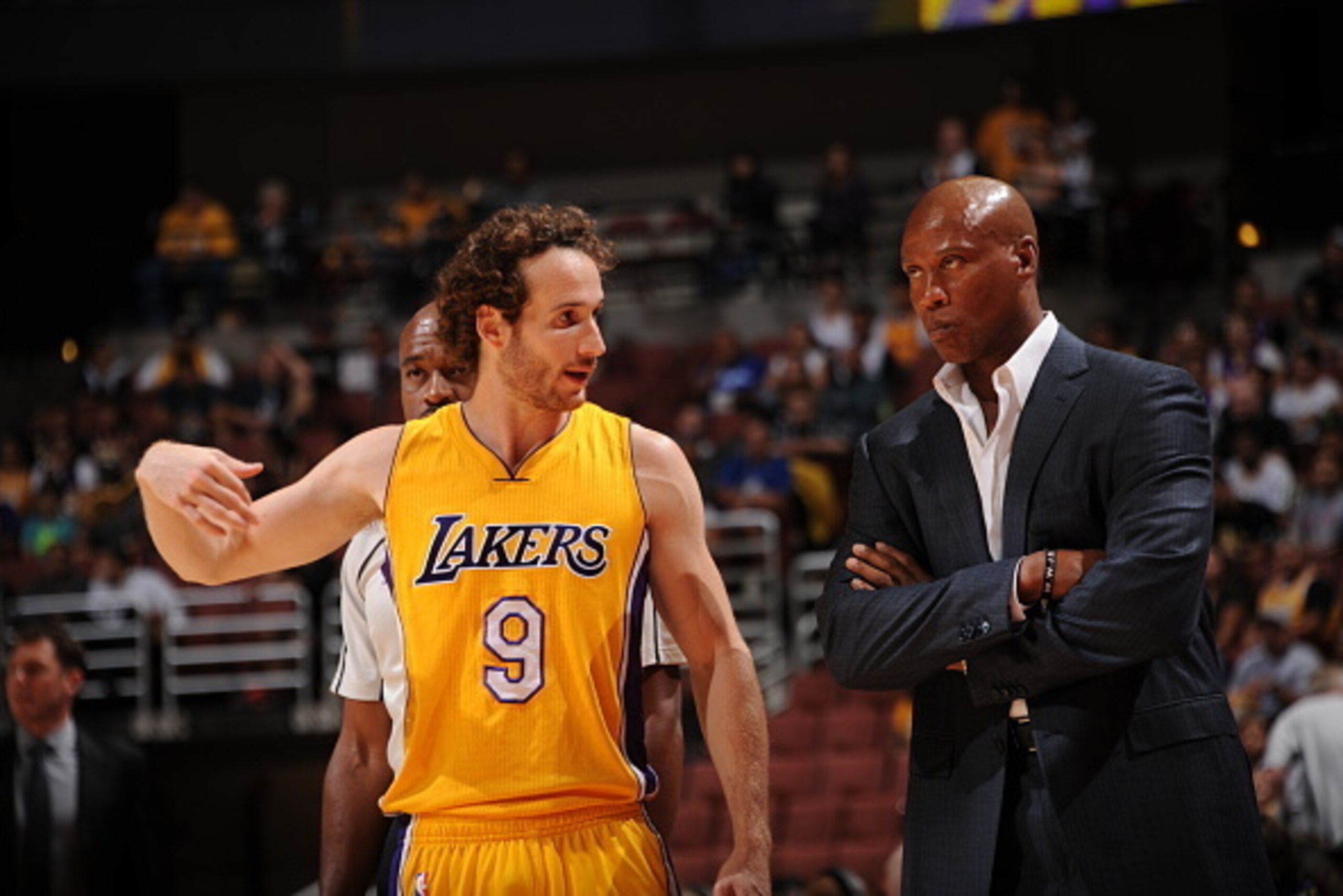 ANAHEIM, CA - OCTOBER 22:  Marcelo Huertas #9 of the Los Angeles Lakers talks to Head Coach Byron Scott of the Los Angeles Lakers against the Golden State Warriors during a preseason game on October 22, 2015 at Honda Center in Anaheim, California. NOTE TO